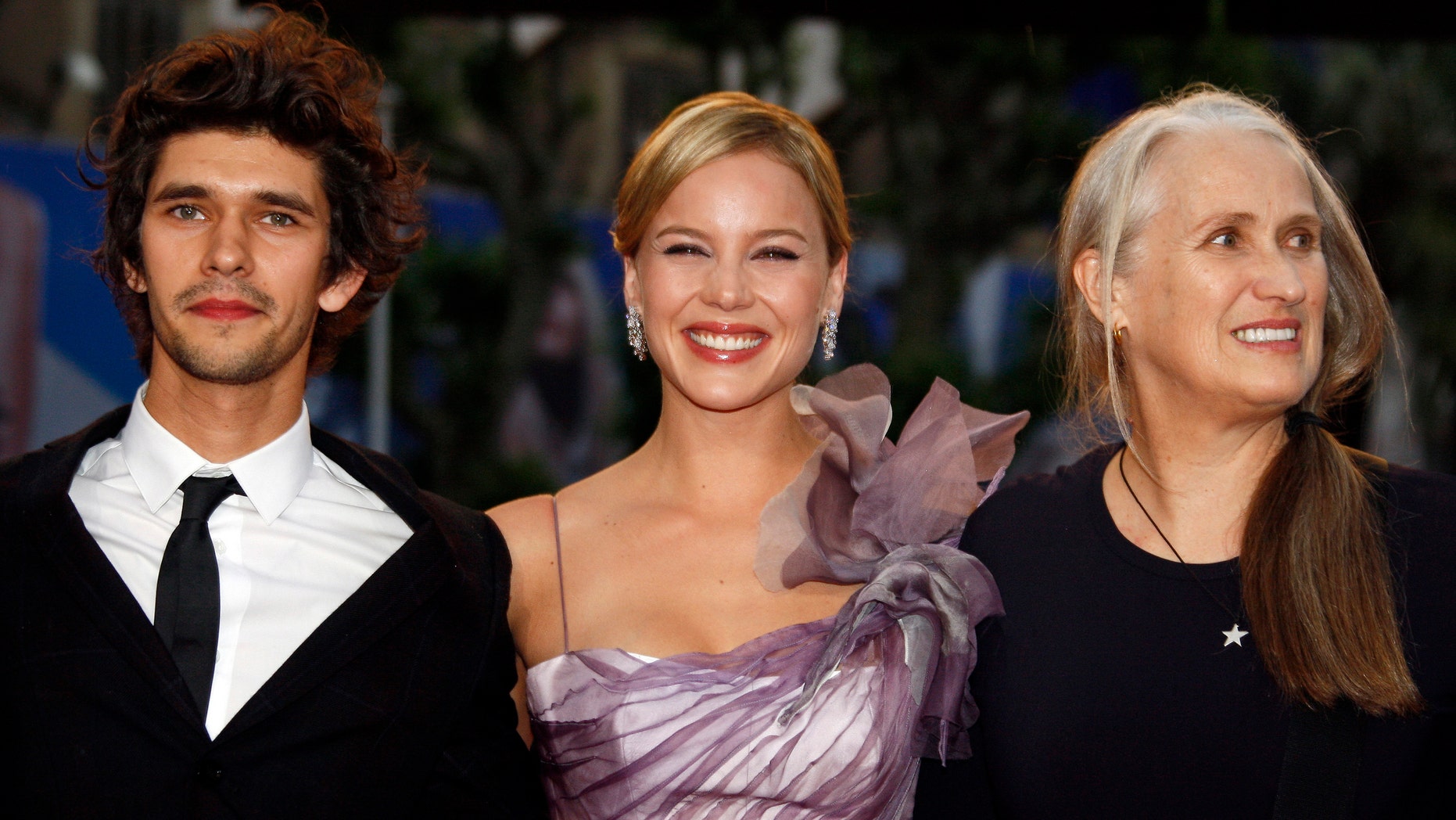 Director Jane Campion (R) with cast members Abbie Cornish (C) and Ben Wishaw (L) arrive for the screening of their film "Bright Star" at the 62nd Cannes Film Festival May 15, 2009. Twenty films compete for the prestigious Palme d'Or which will be awarded on May 24. REUTERS/Jean-Paul Pelissier (FRANCE ENTERTAINMENT) - RTXHC2D
