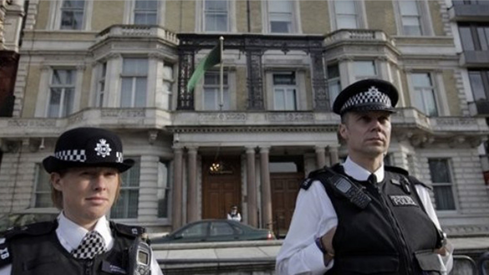 May 1: British police officers guard Libya's embassy in London