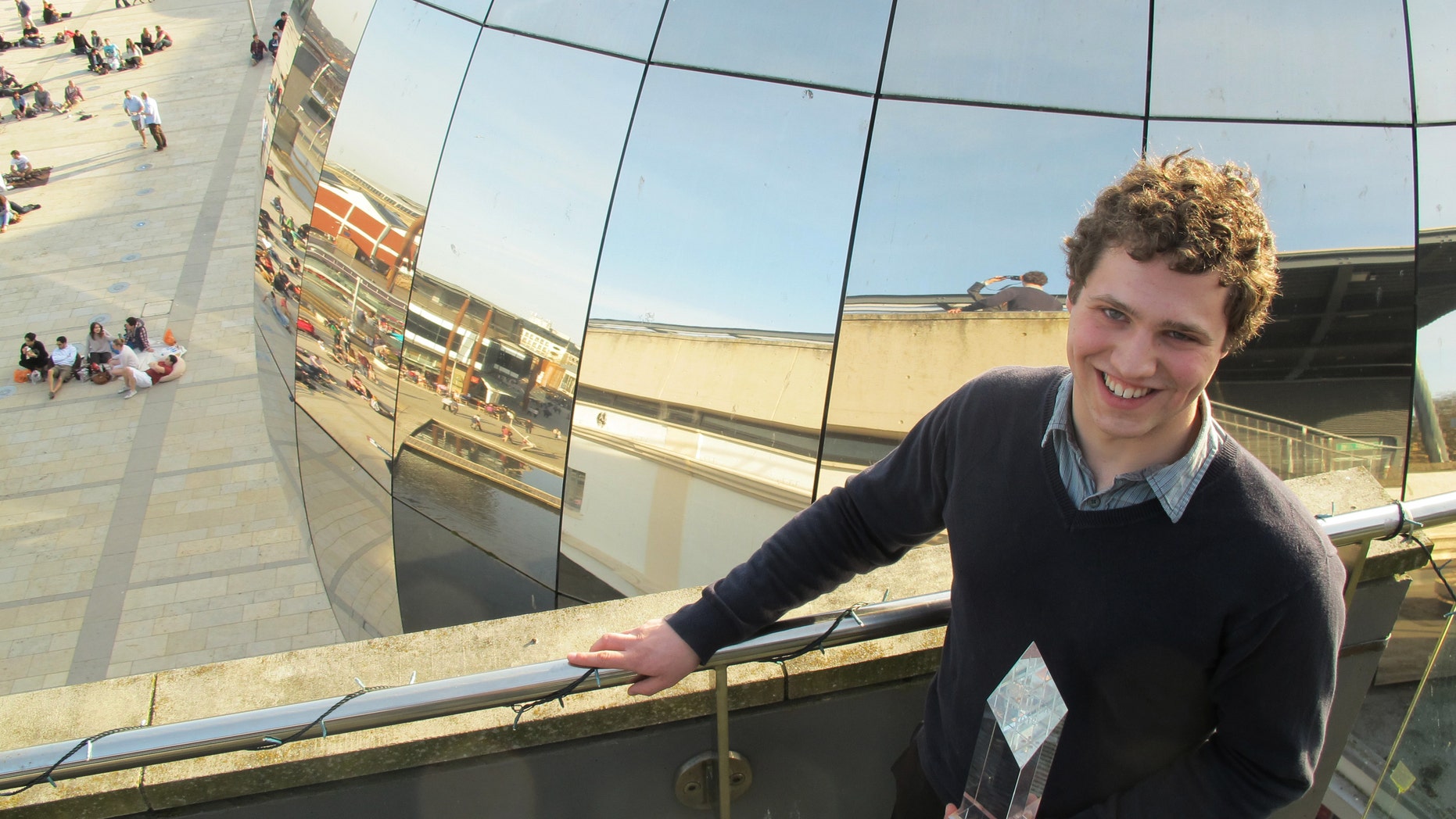March 11, 2012: The Cambridge University student who is named UK Cyber Security Champion Jonathan Millican, poses for a photograph with his trophy at the Science Museum in Bristol, England.