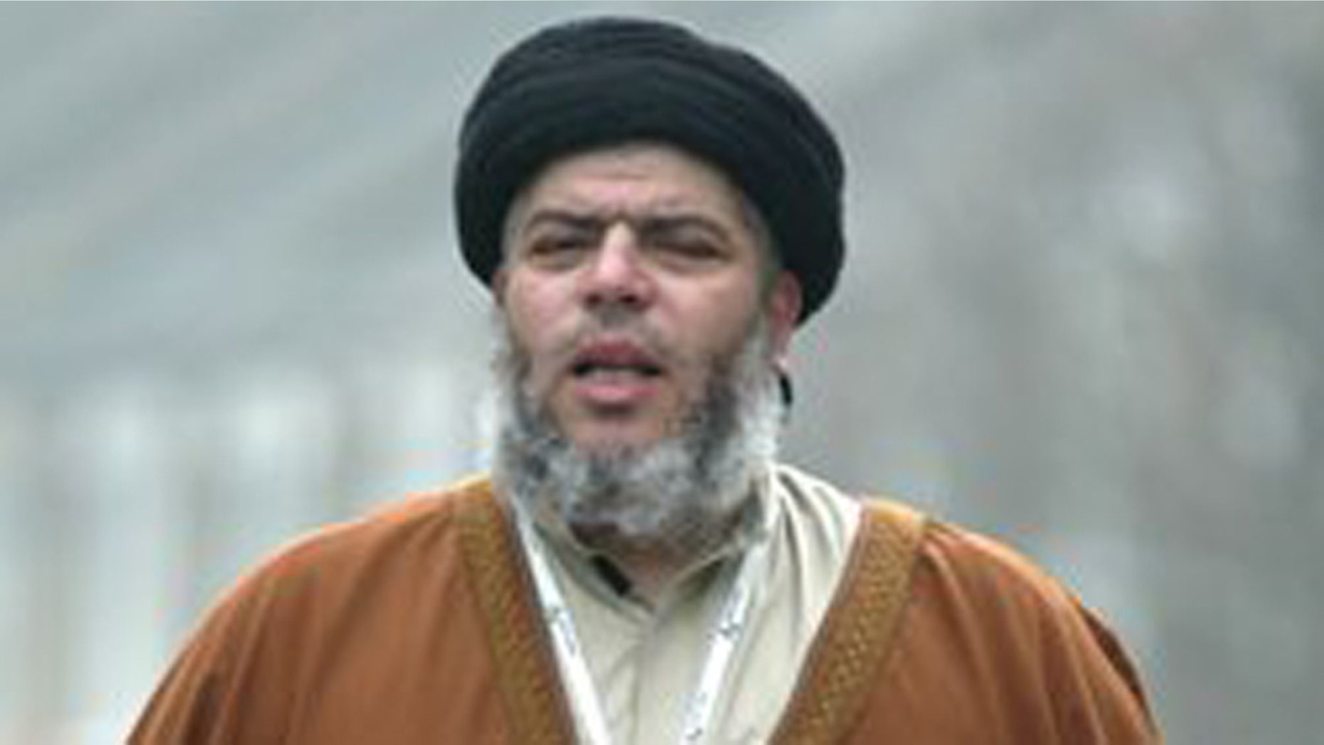 March 28, 2003: In this file photo, radical Muslim cleric Abu Hamza al-Masri prays in a street outside his Mosque in north London Europe's human rights court ruled on Tuesday, April 10, 2012 that it would be legal for Britain to extradite an Egyptian-born radical Muslim cleric and five other terror suspects to the United States.