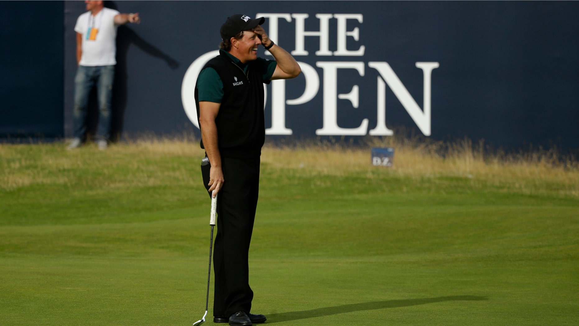 July 14, 2016: Phil Mickelson reacts as he narrowly misses a birdie putt on the 18th green during the first round of the British Open Golf Championships at the Royal Troon Golf Club in Troon, Scotland.