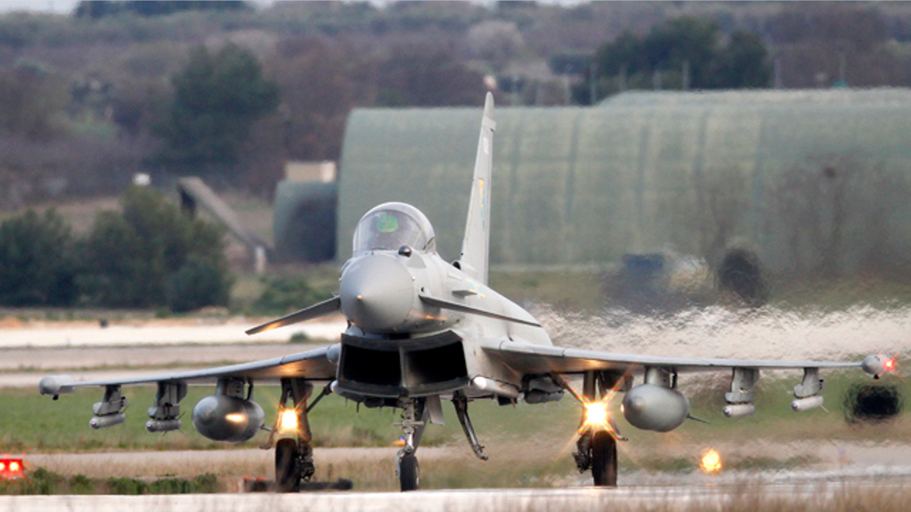 March 20: A British Typhoon jet lands at a NATO airbase in southern Italy.