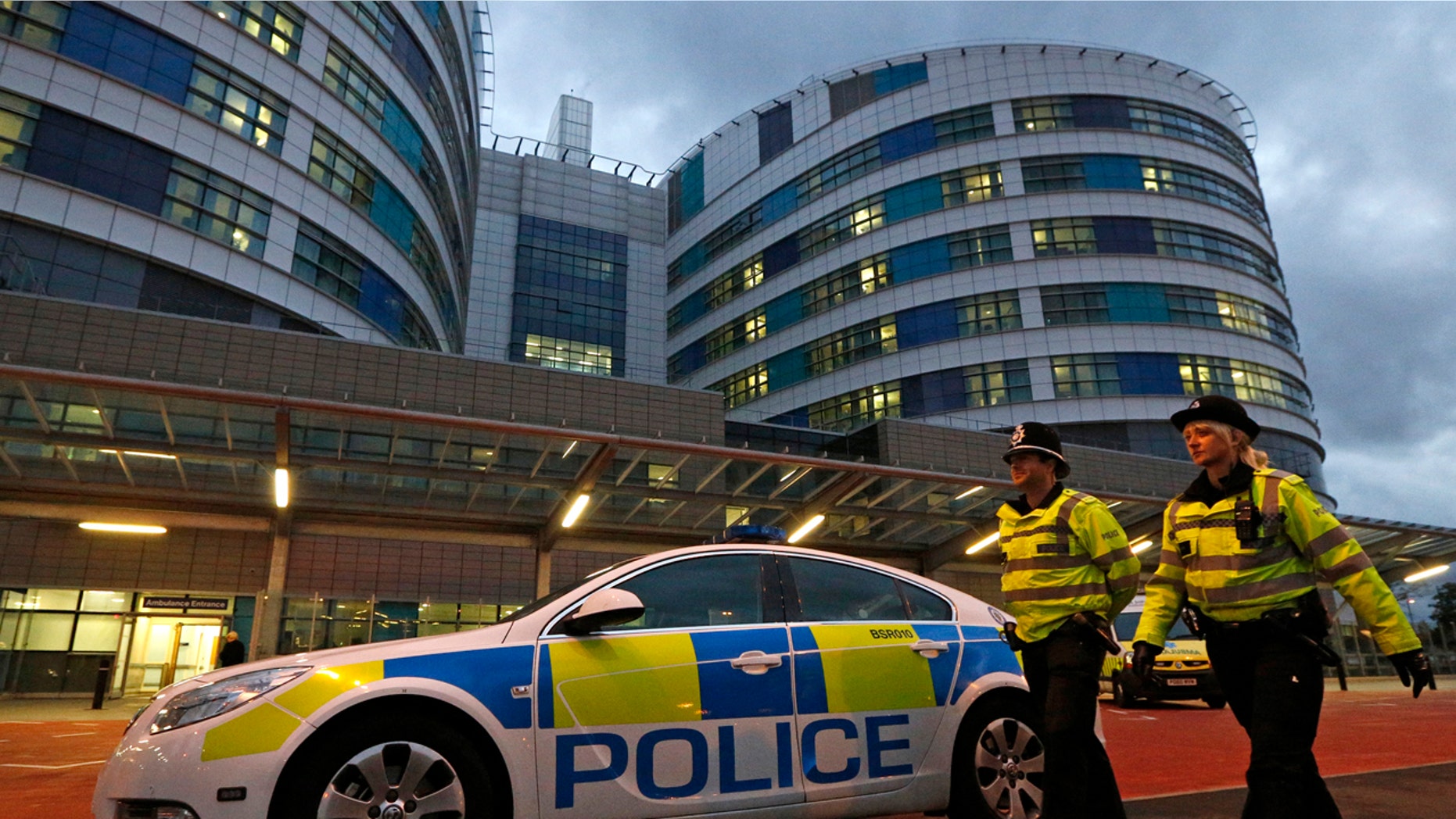 A surgeon who worked at Queen Elizabeth Hospital, seen above in 2012, admitted to etching his initials into two patients' livers during operations.