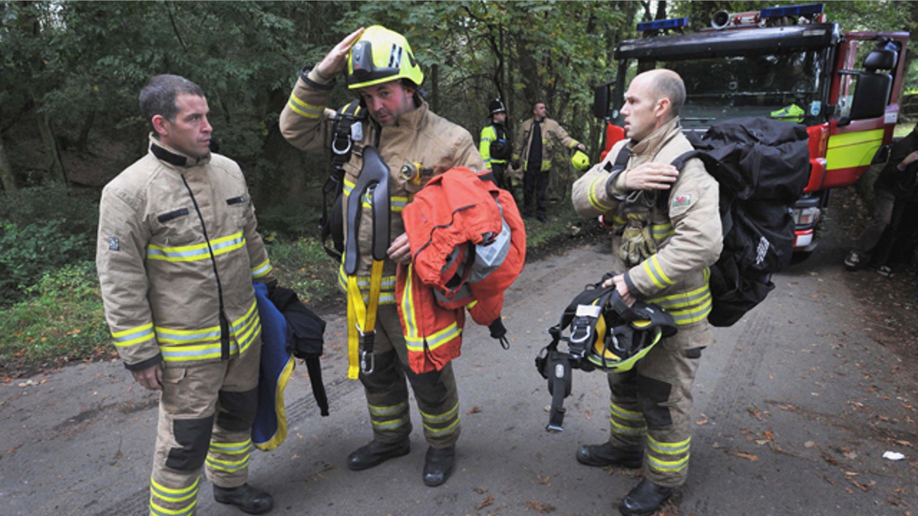 Sept. 16: Rescue workers arrive at the Gleision Colliery near Swansea, south Wales as a body is located in the flooded mine. British rescue workers found one miner dead after searching a flooded coal mine in south Wales, but pressed on Friday with the search for three others trapped underground.