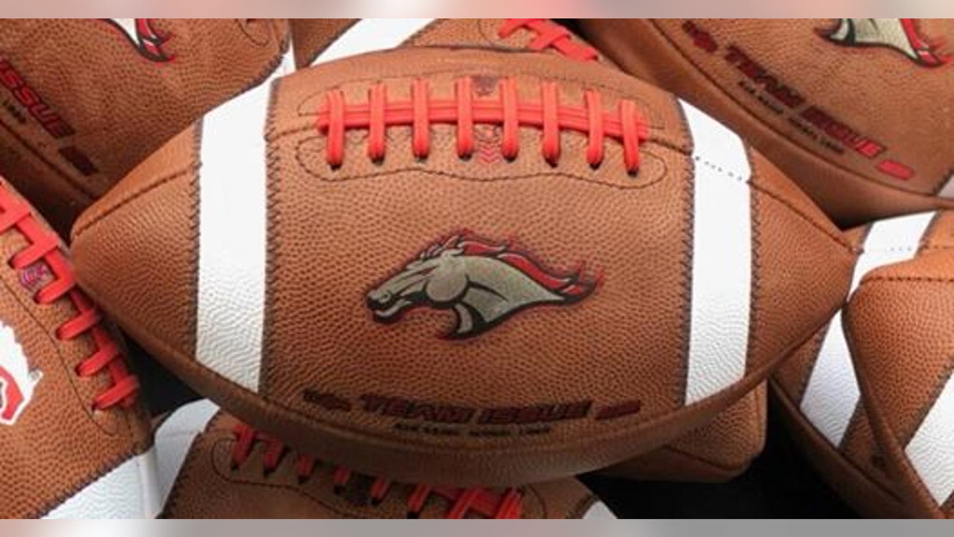 The logo of Brophy Prep's Broncos is seen on game footballs.