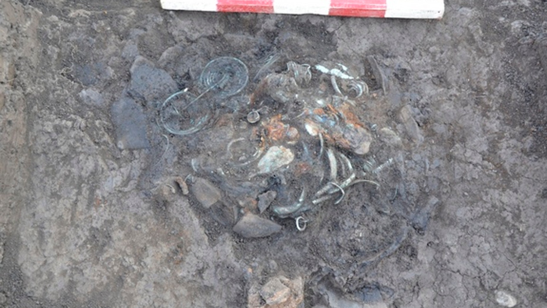 Two hoards (one of which is shown here), dating back to the eighth century B.C., may have been offerings to deities, scientists say.