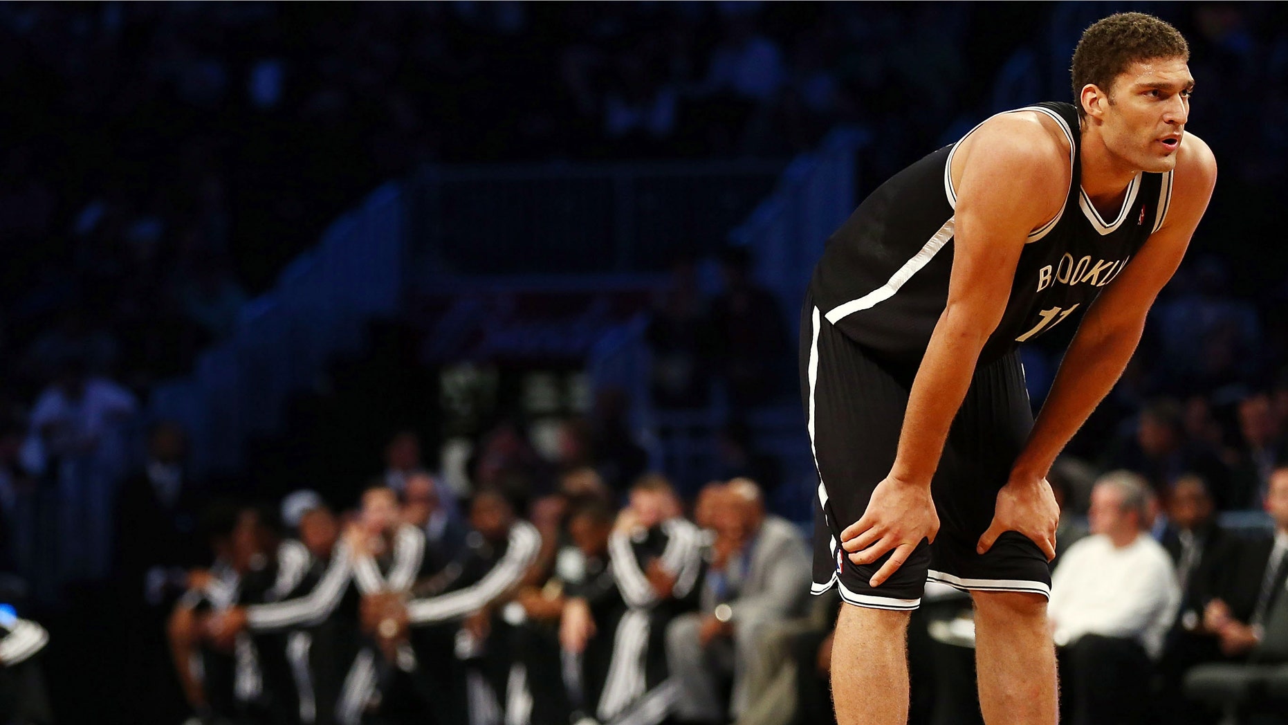 Brook Lopez looks on before taking a free throw during a preseason game against the Washington Wizards at the Barclays Center on October 15, 2012 in New York City.
