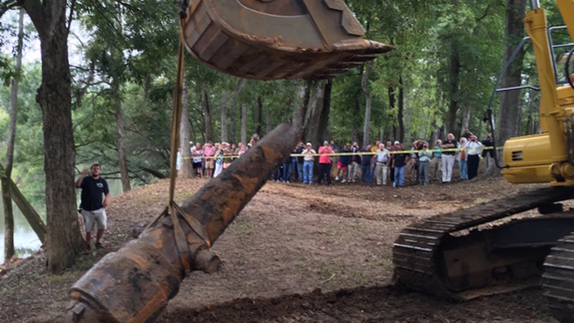 A giant frontend loader was used to pull the heavy cannons from the riverbed.