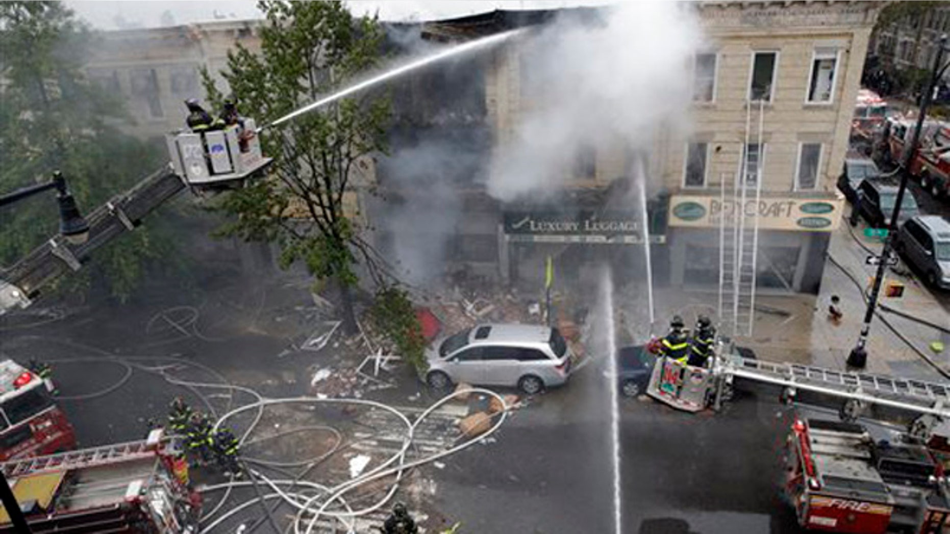 Oct. 3, 2015: Firefighters work at the at the scene of an explosion at a three-story building in the Borough Park neighborhood in the Brooklyn borough of New York.