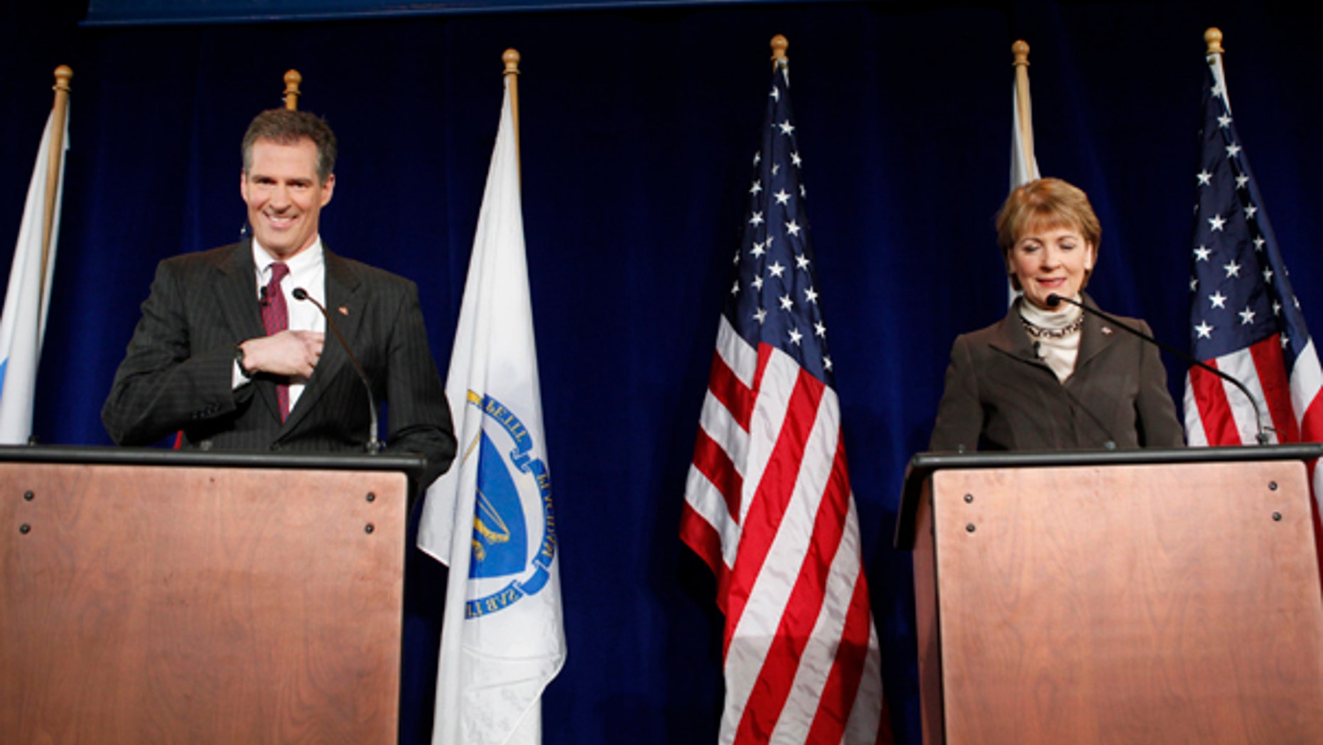 Monday: Republican Scott Brown and Democrat Martha Coakley make last minute preparations before a debate on the campus of the University of Massachusetts in Boston. (AP Photo)