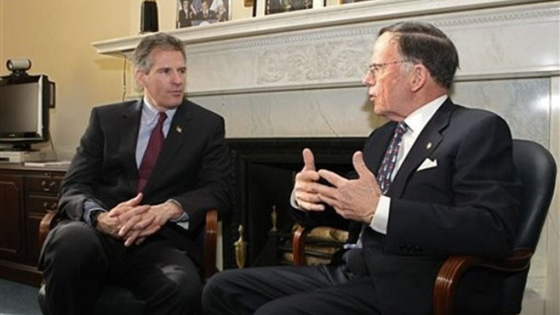 Sen.-elect Scott Brown, left, meets with Sen. Paul Kirk, the interim senator for Massachusetts, on Capitol Hill Jan. 21. (AP Photo)