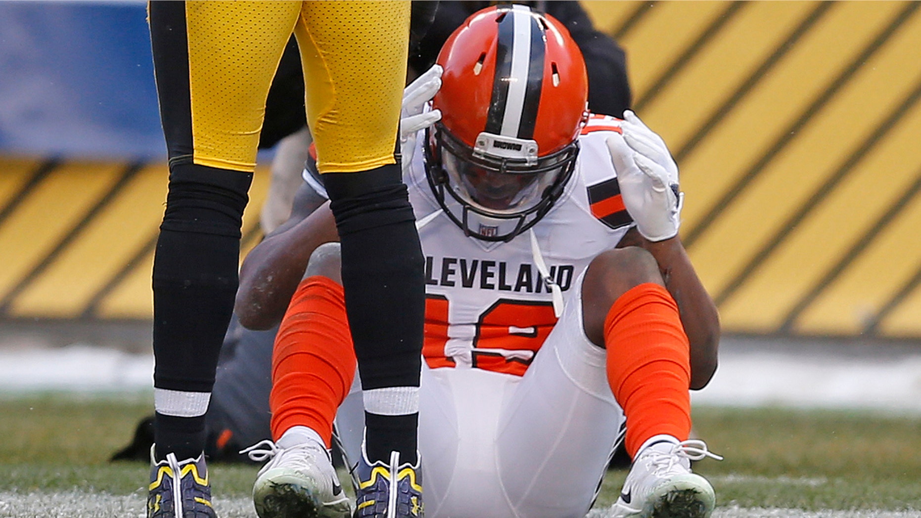 Cleveland Browns wide receiver Corey Coleman (19) sits on the field after allowing a pass from quarterback DeShone Kizer to go through his hands for an incompletion during the second half of an NFL football game against the Pittsburgh Steelers in Pittsburgh, Sunday, Dec. 31, 2017.