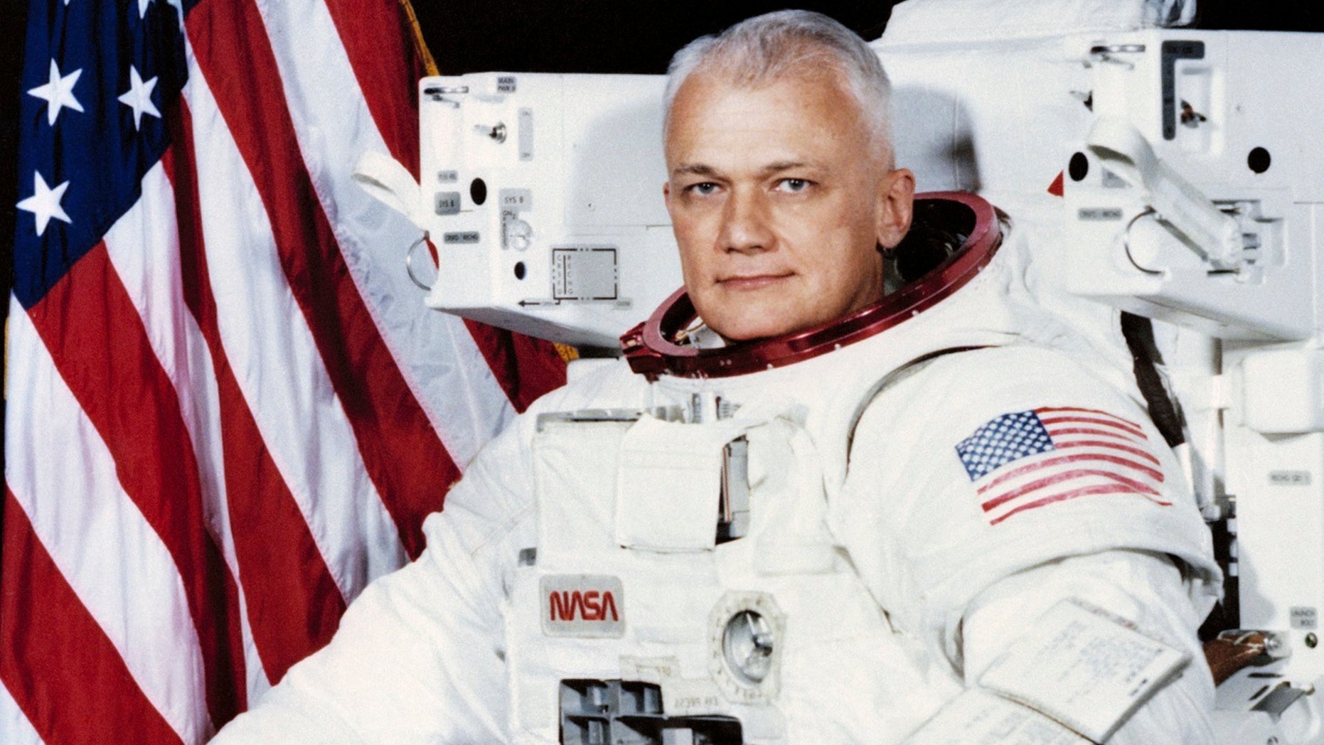 File 1982: Astronaut Bruce McCandless wears a shuttle Extravehicular Activity (EVA) Suit with Manned Maneuvering Unit (MMU) in Houston. The NASA Johnson Space Center says he died Thursday.