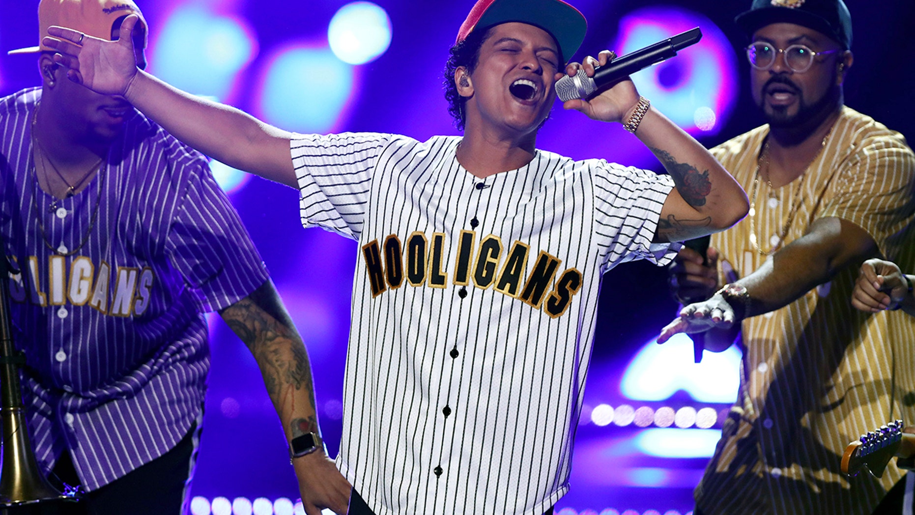 Bruno Mars forced to temporarily stop concert after stage catches fire