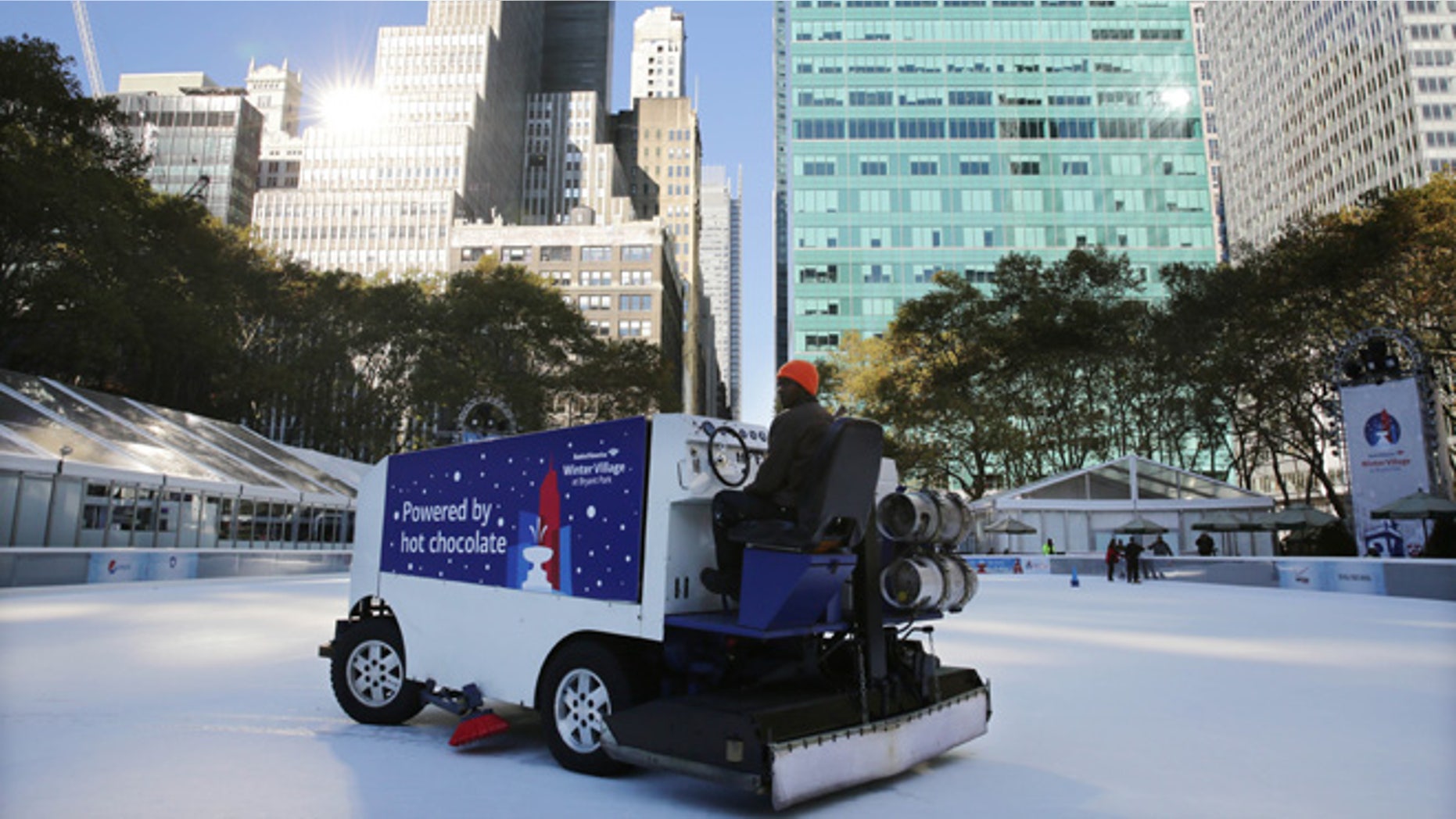 Nov. 10, 2013: The ice rink at Bryant Park in New York is resurfaced. A shooting at the ice rink at the popular midtown Manhattan park late Saturday sent two men to the hospital with non-life-threatening injuries, police said.