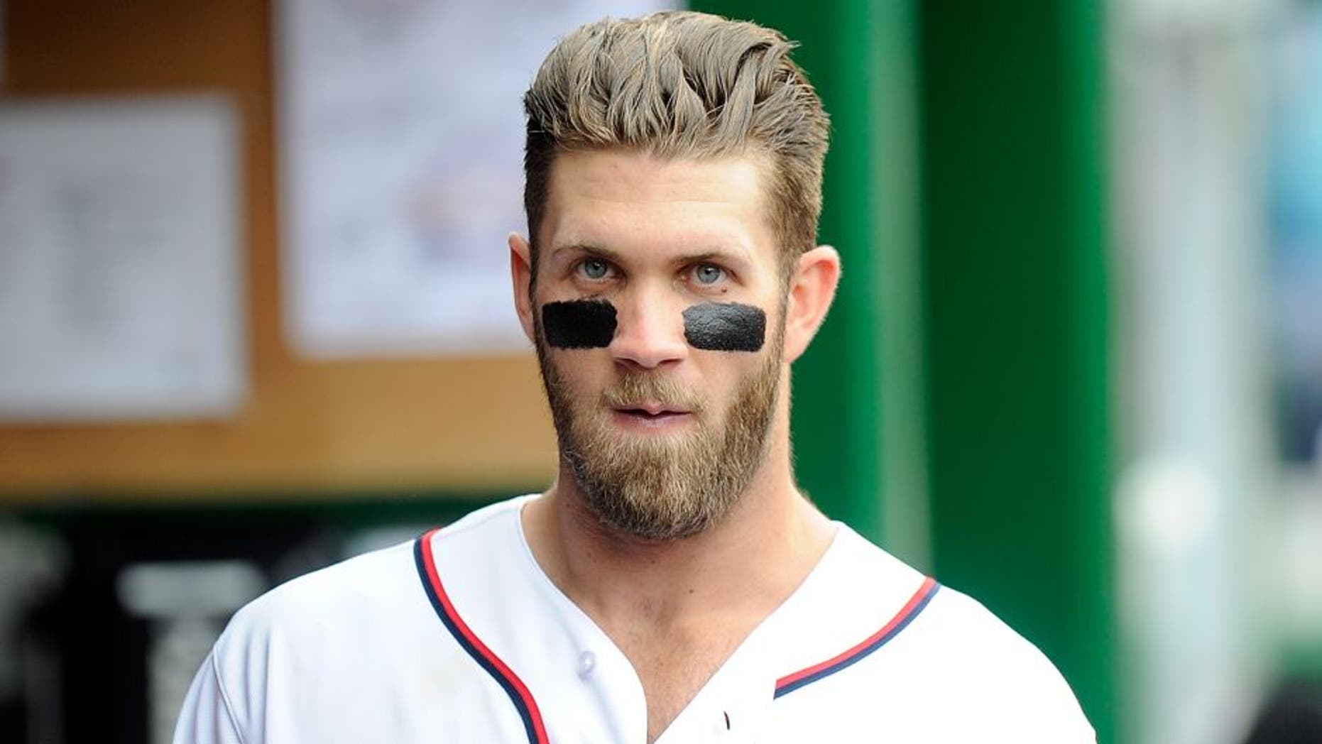 WASHINGTON, DC - JUNE 02: Bryce Harper #34 of the Washington Nationals watches the game against the Toronto Blue Jays at Nationals Park on June 2, 2015 in Washington, DC. (Photo by G Fiume/Getty Images)