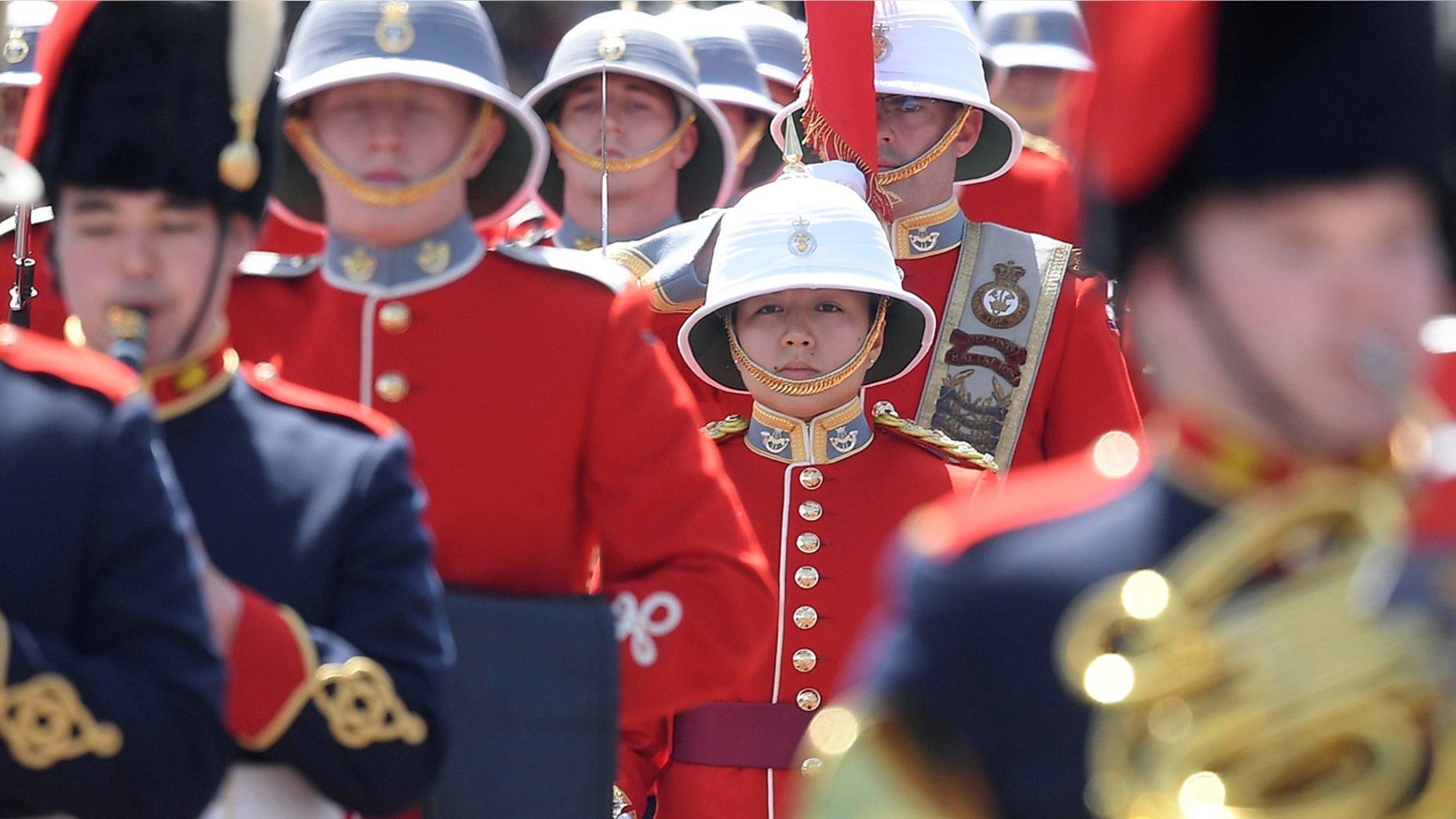 Captain Megan Couto of the 2nd Battalion, Princess Patricia's Canadian Light Infantry (C), commands the Queen's Guard, during the Changing of the Guard ceremony, to become the first female officer to do so, at Buckingham Palace, in London, Britain June 26, 2017.