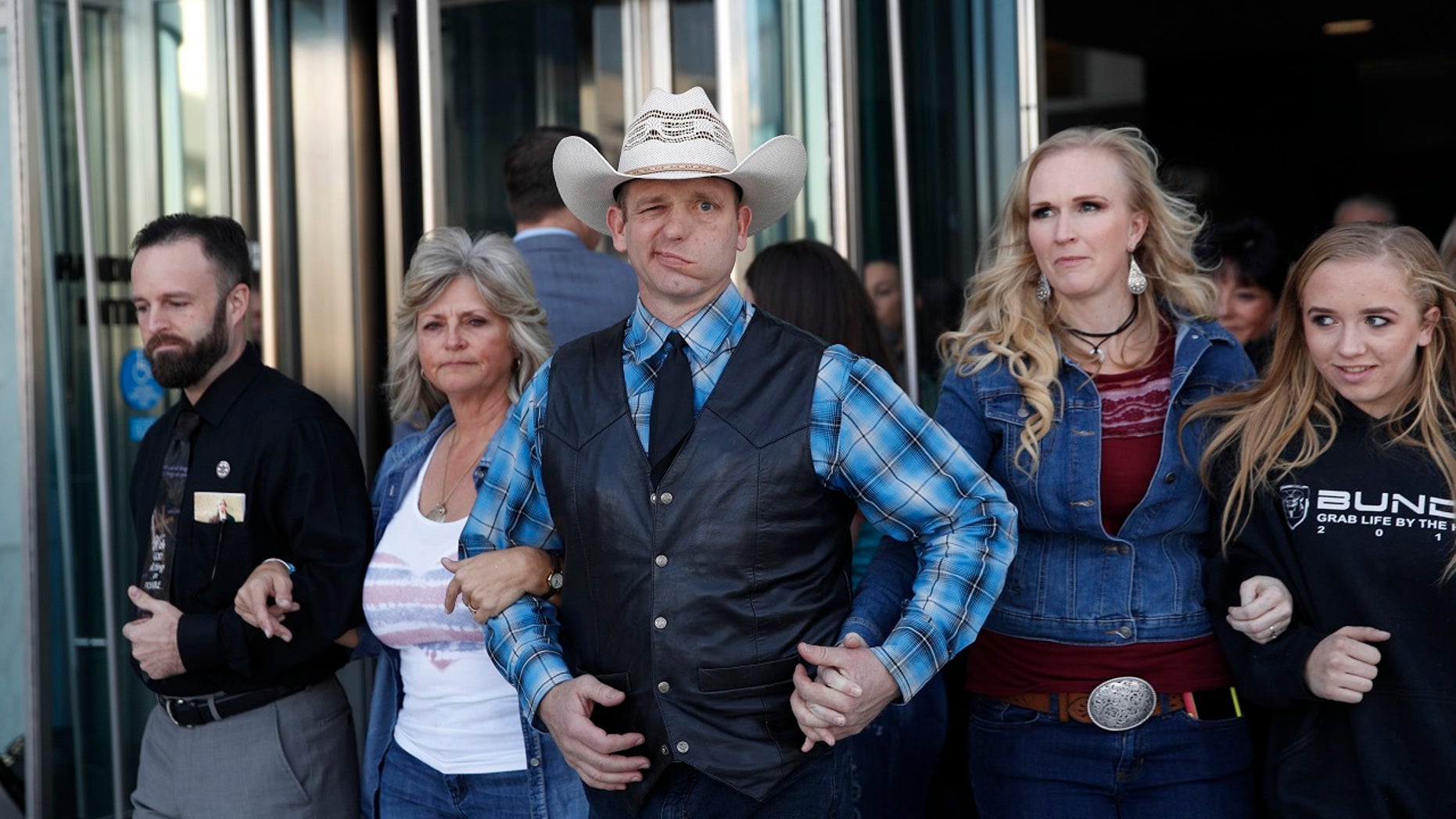Ryan Bundy, center, eldest son of Cliven Bundy, the Nevada rancher involved in an armed standoff with federal agents in 2014, announced on Thursday he'll run for governor as a states' rights fundamentalist.