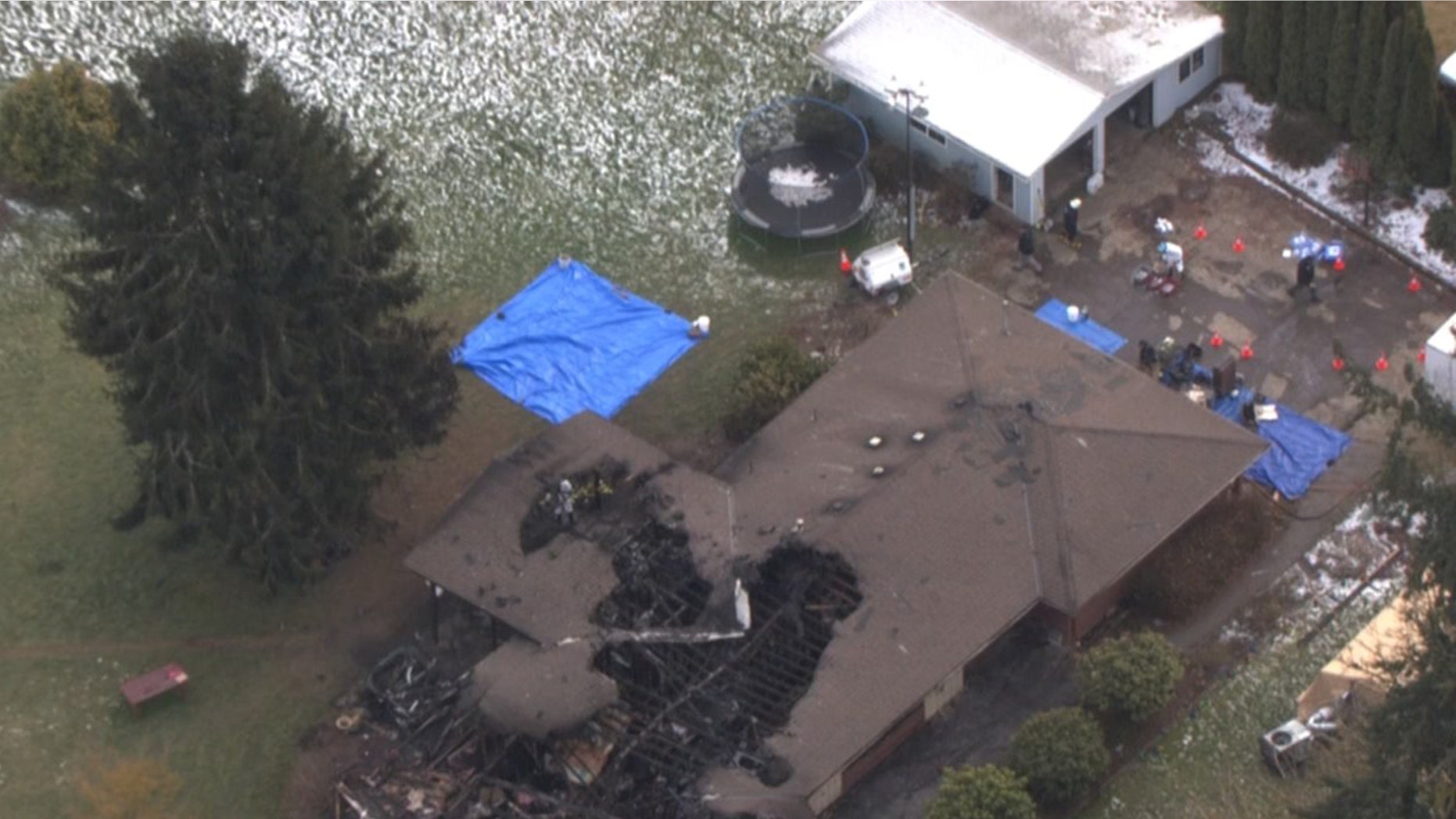 The burned home of the Kroeker family in Hubbard, Oregon.