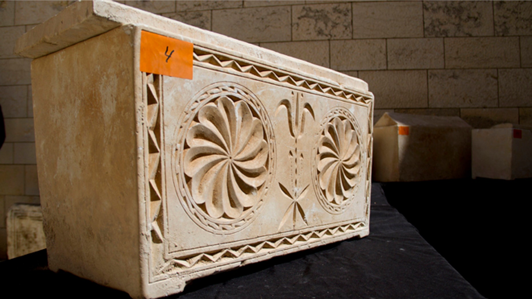 March 31, 2014: A 2,000 year-old Jewish burial box is on display in Jerusalem.
