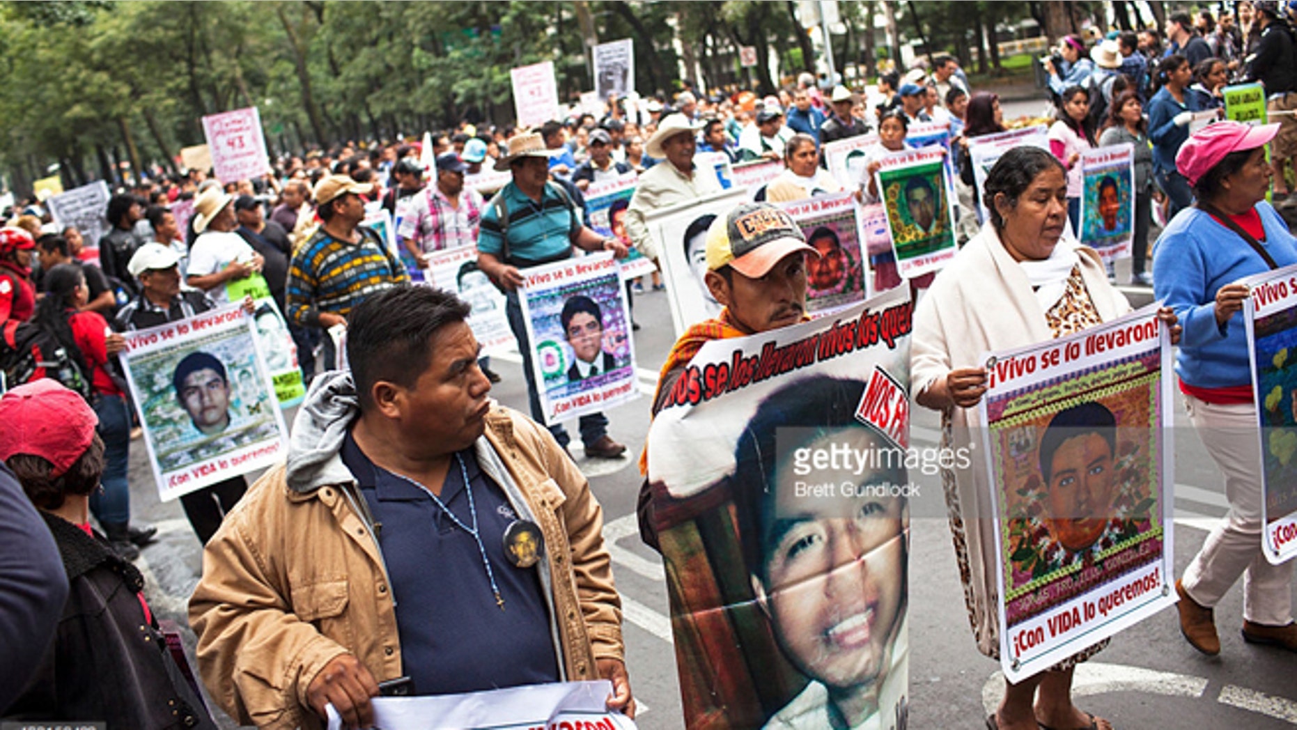 Family of 43 missing students from Ayotzinapa Normal school in the state of Guerrero lead a protest, September 26, 2015 in Mexico City, Mexico. (Photo by Brett Gundlock/Getty Images)