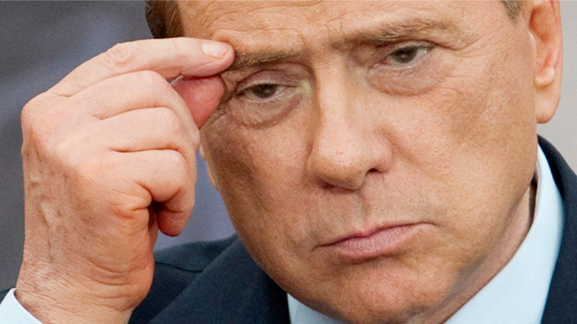June 13: Italian Premier Silvio Berlusconi gestures during a joint press conference with Israel's Prime Minister Benjamin Netanyahu, in Rome.