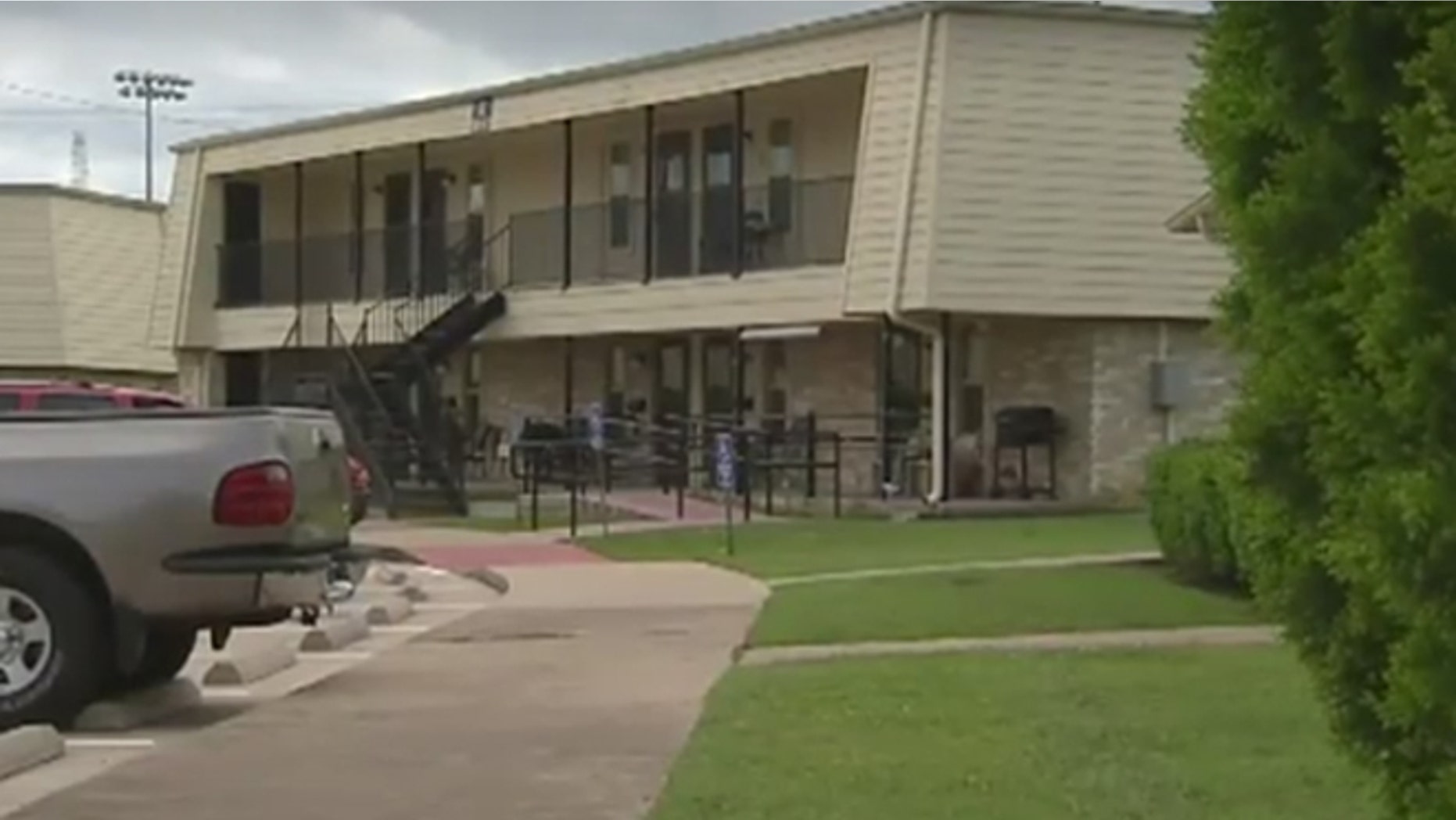 Video images shows the Crestmoor Park South Apartments in Burleson, Texas, where a toddler died after being left in a hot car for hours.
