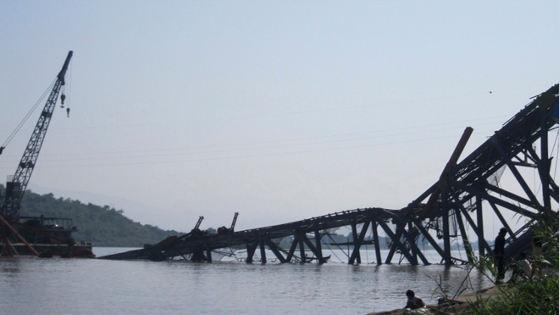 Nov. 11, 2012: A bridge under construction across the Irrawaddy River, east of Shwebo, Myanmar is seen collapsed after a strong earthquake.