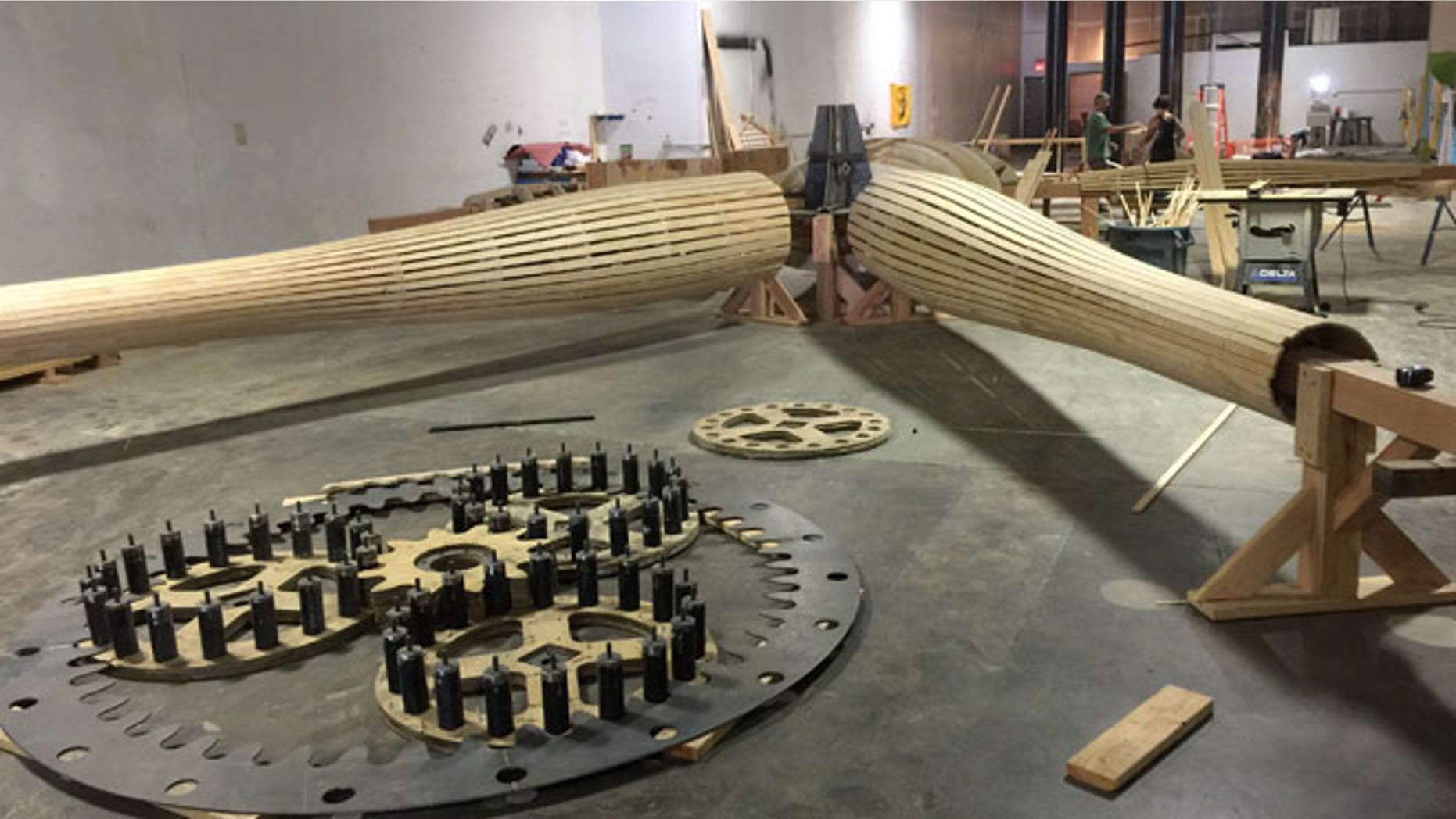 Inside a vast studio in San Leandro, California, The Man is being assembled by a small army of artists and designers.