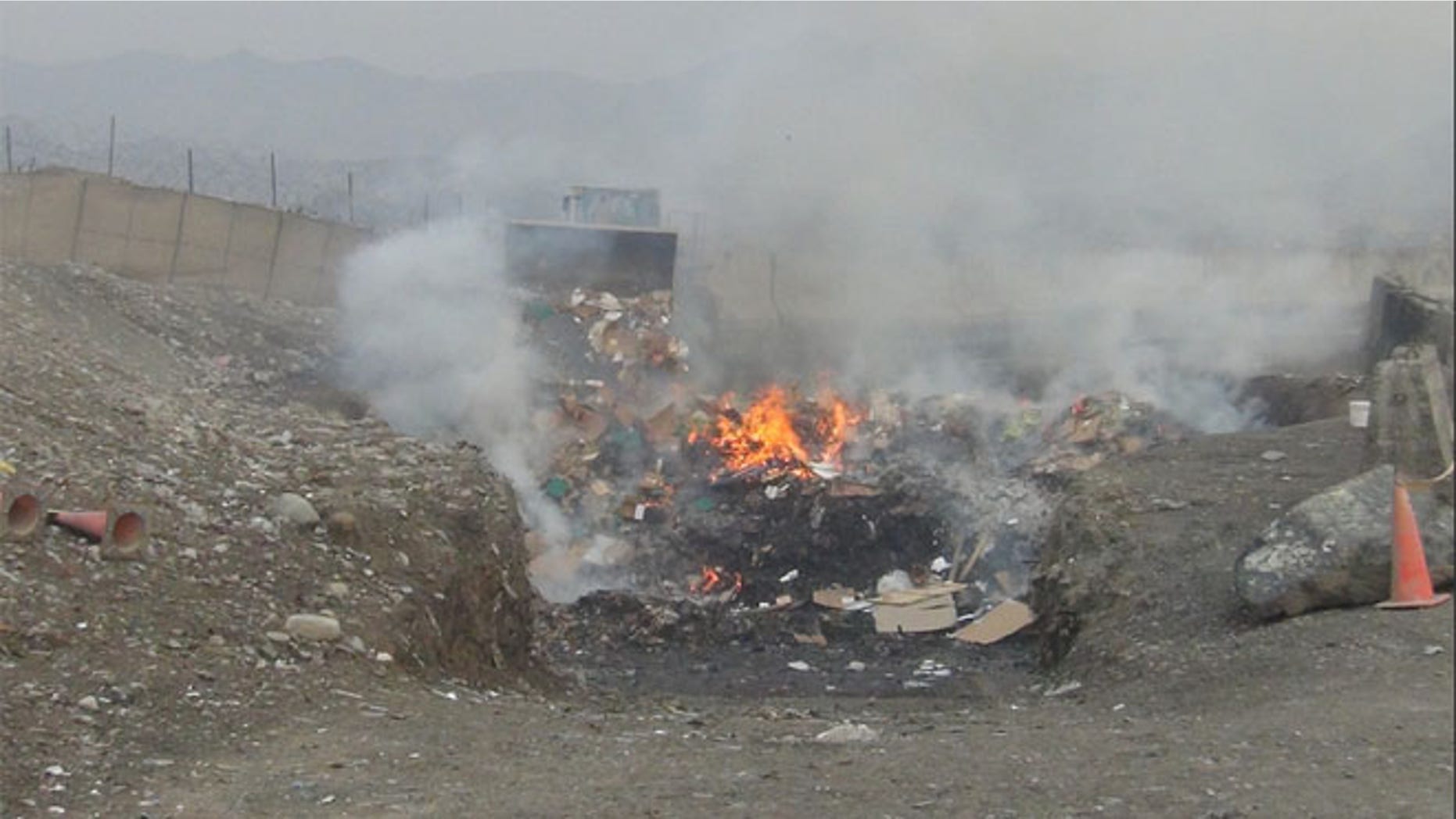 Shown here is a burn pit at Shindand Air Base in Afghanistan.