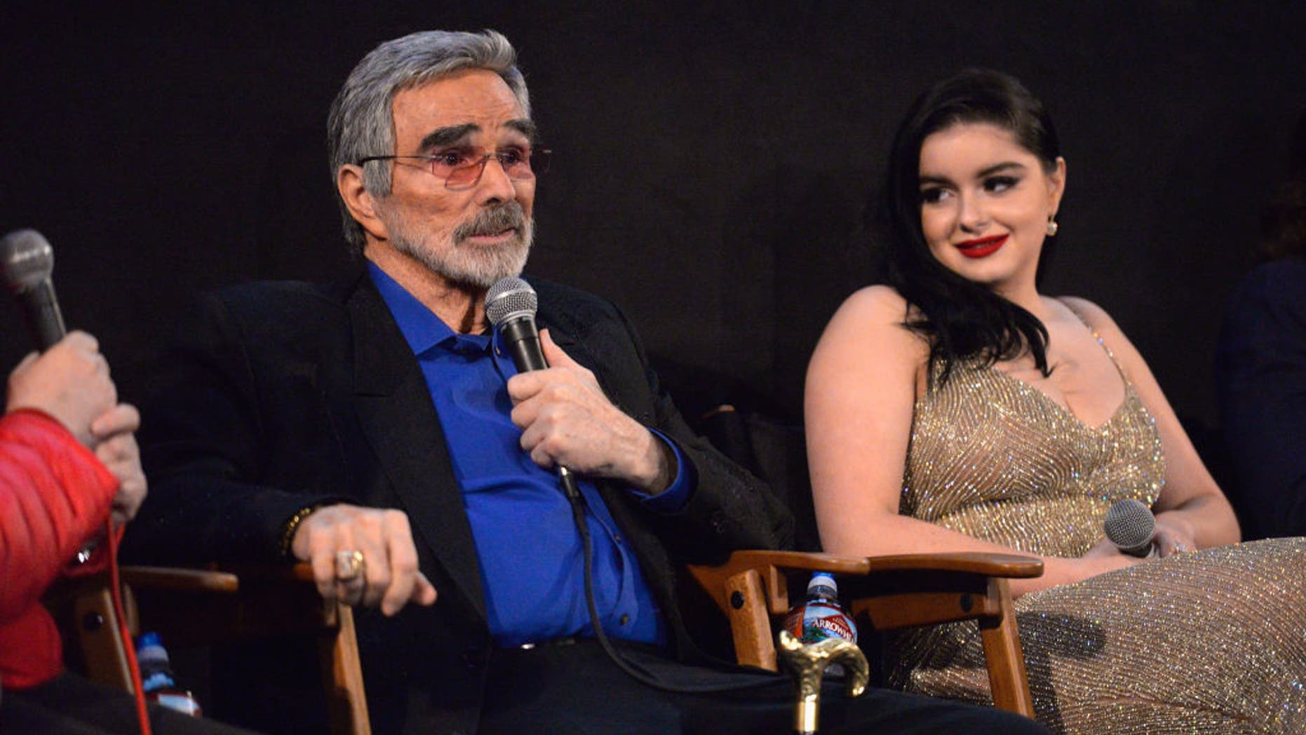 Actors Burt Reynolds and Ariel Winter address the audience during a Q&A session at the Los Angeles premiere of 'The Last Movie Star' at the Egyptian Theatre on March 22, 2018 in Hollywood, California.
