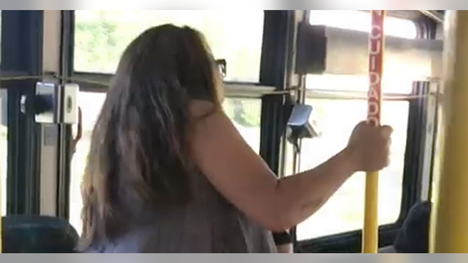 A woman's racist bus rant was captured on video.