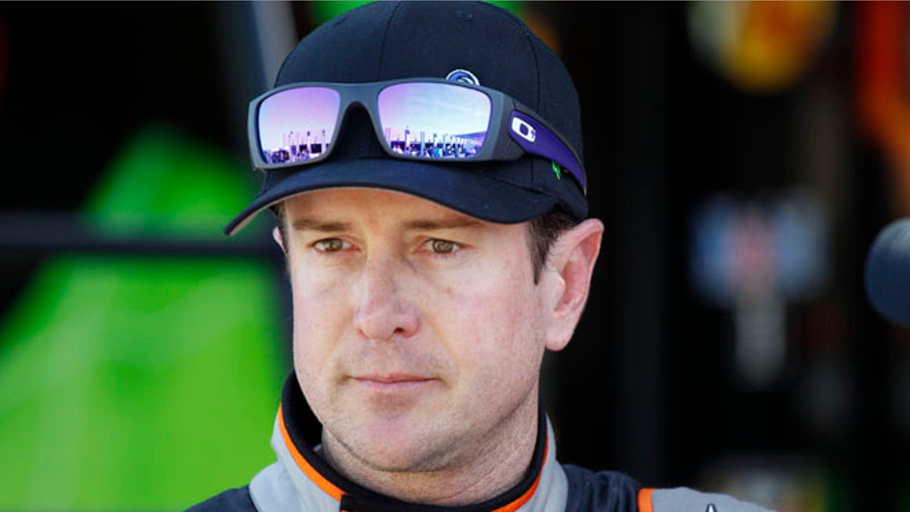 Oct. 9, 2014: Kurt Busch looks from the garage after practice for the NASCAR Bank of America Sprint Cup series auto race at Charlotte Motor Speedway in Concord, N.C.