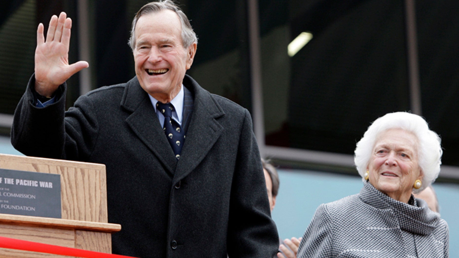 FILE - In this Dec. 7, 2009 file photo, former President George H.W. Bush and former first lady Barbara Bush arrive for a ceremony to dedicate an expanded gallery that carries his name at the National Museum of the Pacific War, in Fredericksburg, Texas. (AP Photo/Eric Gay, File)