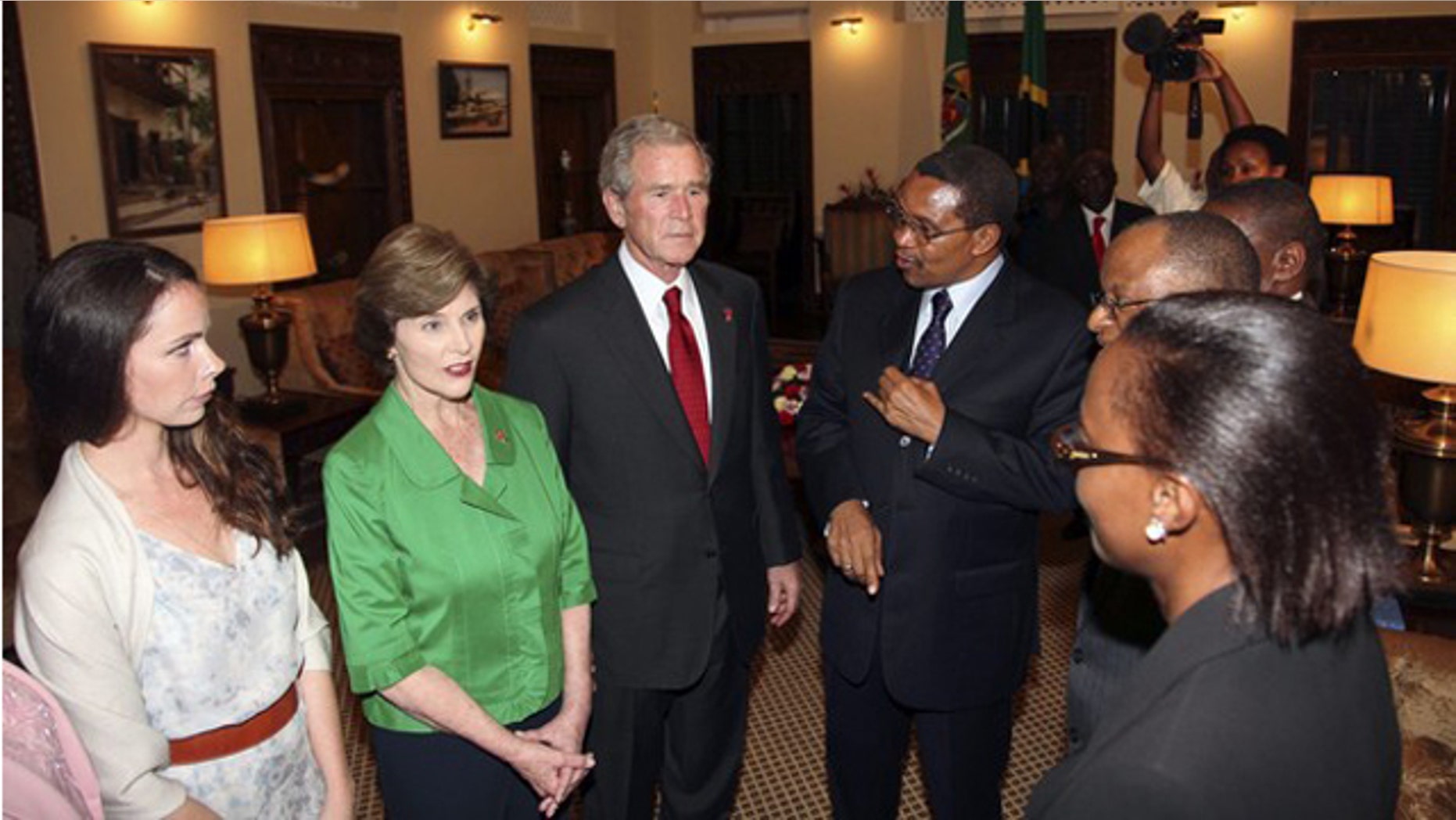 Dec. 1, 2011: Former President George W. Bush speaks with Tanzanian President Jakaya Kikwete upon arriving at the State House in Dar es Salaam.