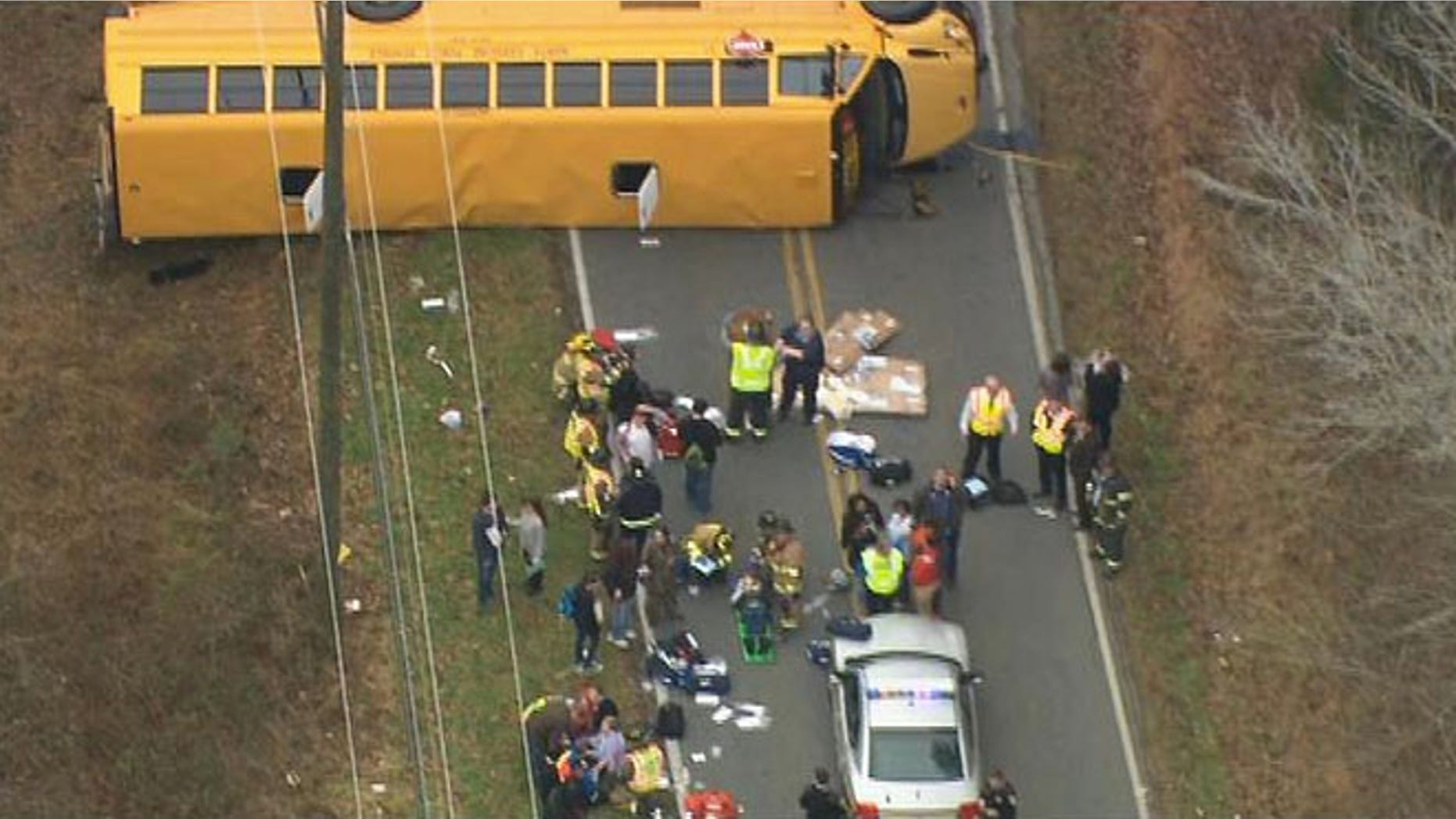 Jan. 14, 2015: In this image made from video and released by WSOC-TV, authorities render aid to school children in Gastonia, N.C. (AP)