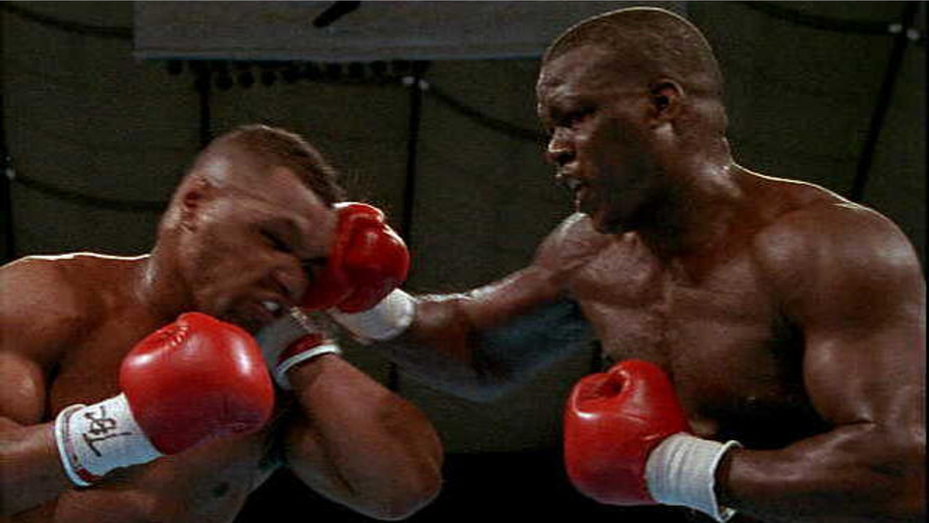 Buster Douglas (R) and Mike Tyson (L) in 1990