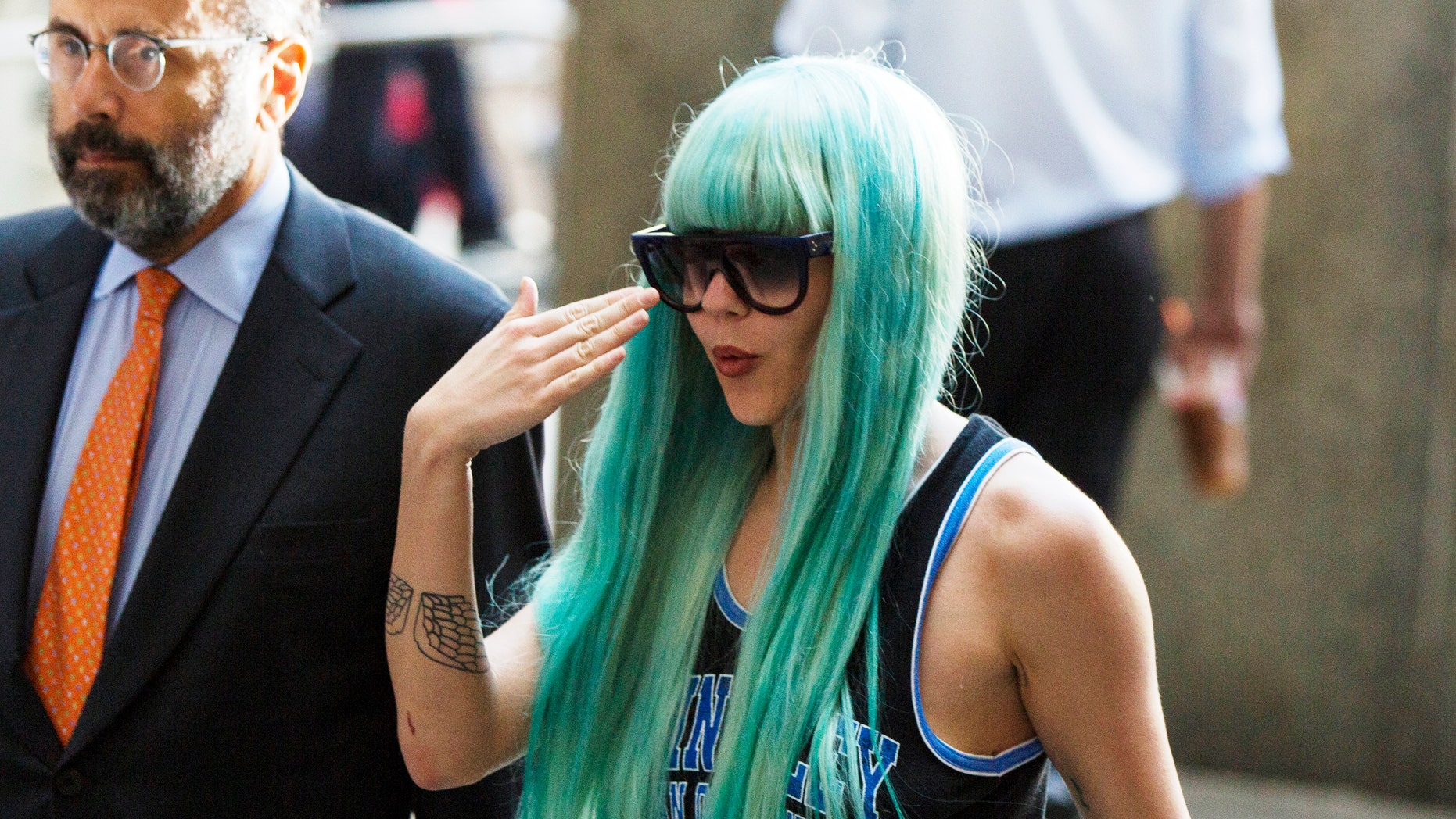 July 9, 2013. Actress Amanda Bynes arrives for a court hearing at Manhattan Criminal Court in New York.