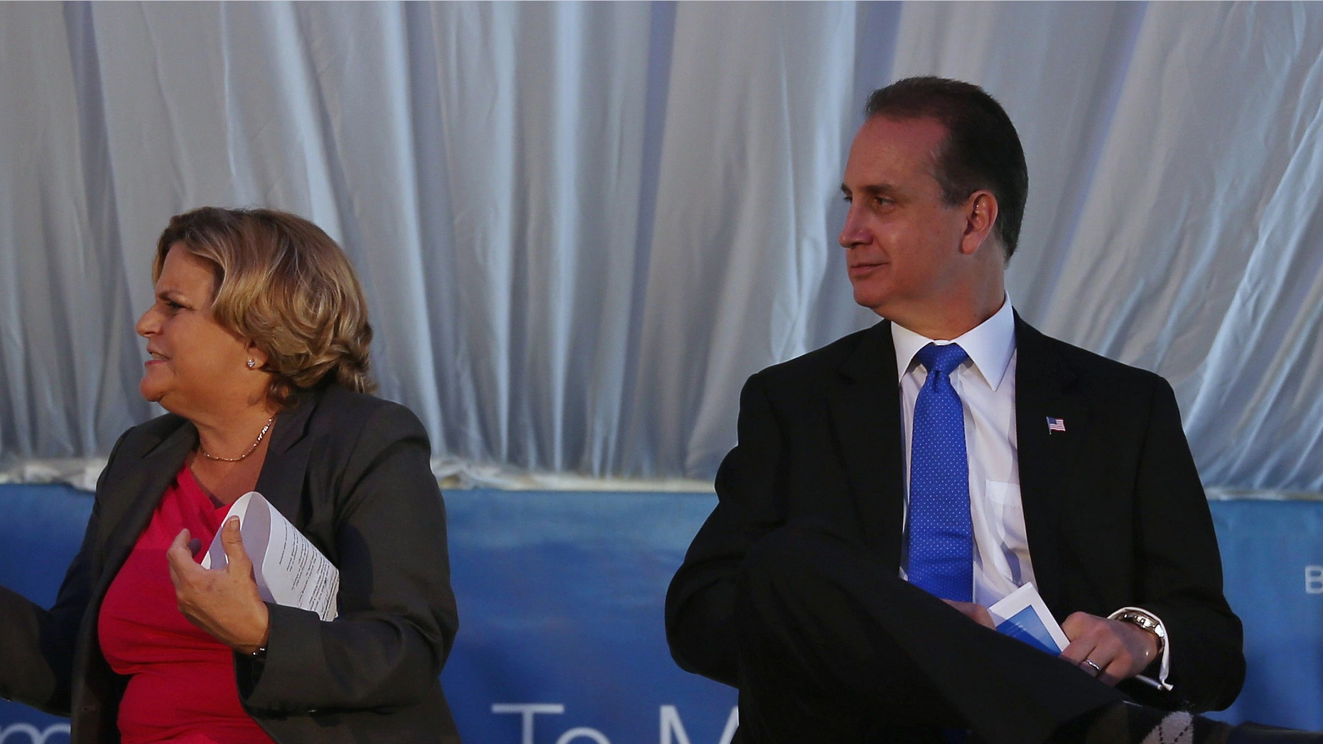 MIAMI, FL - AUGUST 29: (L-R) Florida Gov. Rick Scott (L) sits with Rep. Ileana Ros-Lehtinen (R-FL), Rep. Mario Diaz-Balart (R-FL) and Rep. Joe Garcia (D-FL) at the grand opening of the main North American training campus for Boeing that includes full-flight simulators for the 787 Dreamliner on August 29, 2013 in Miami, Florida. Boeing officials say the Miami campus will be one of the largest airline training centers in the world. (Photo by Joe Raedle/Getty Images)
