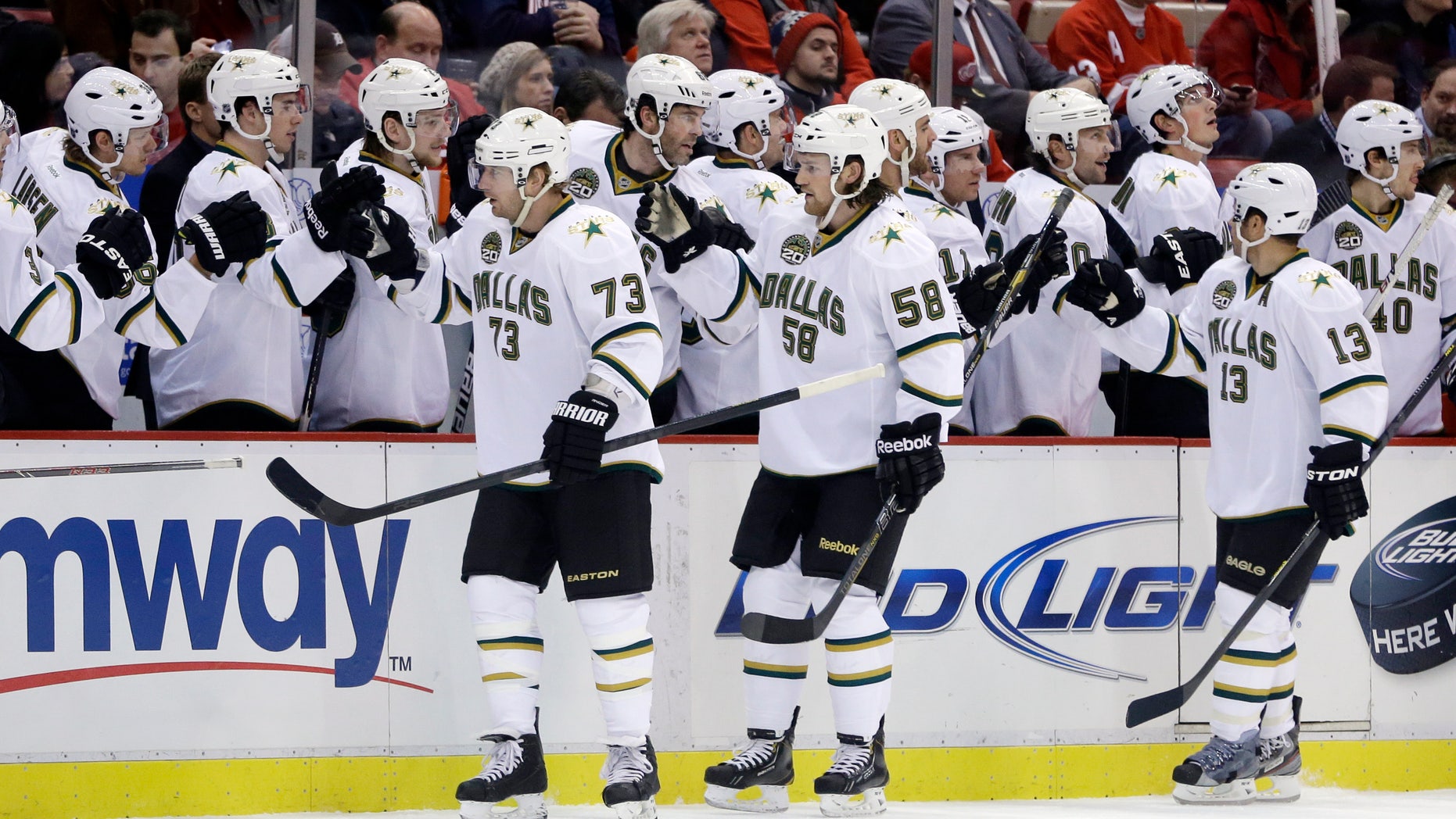 Dallas Stars right wing Michael Ryder (73) is congratulated by teammates after his goal during the first period of an NHL hockey game against the Detroit Red Wings in Detroit, Tuesday, Jan. 22, 2013. (AP Photo/Carlos Osorio)