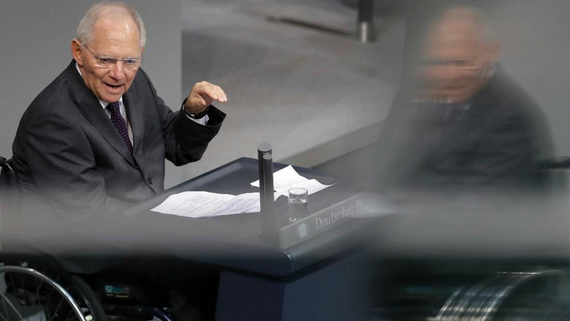 German Finance Minister Wolfgang Schaeuble speaks during a budget debate as part of a meeting of the German Federal Parliament, Bundestag, at the Reichstag building in Berlin, Germany, Tuesday, Nov. 22, 2016. (AP Photo/Michael Sohn)
