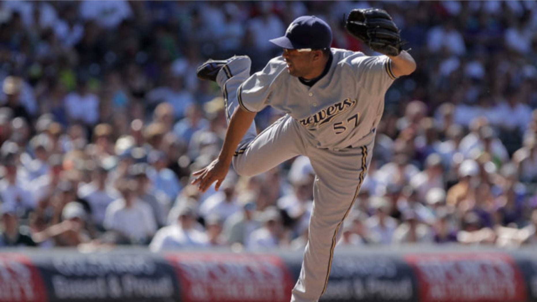 DENVER, CO - JULY 17: Relief pitcher Francisco Rodriguez #57 of the Milwaukee Brewers delivers against the Colorado Rockies at Coors Field on July 17, 2011 in Denver, Colorado. Rodriguez earned a hold as they Brewers defeated the Rockies 4-3. (Photo by Doug Pensinger/Getty Images)