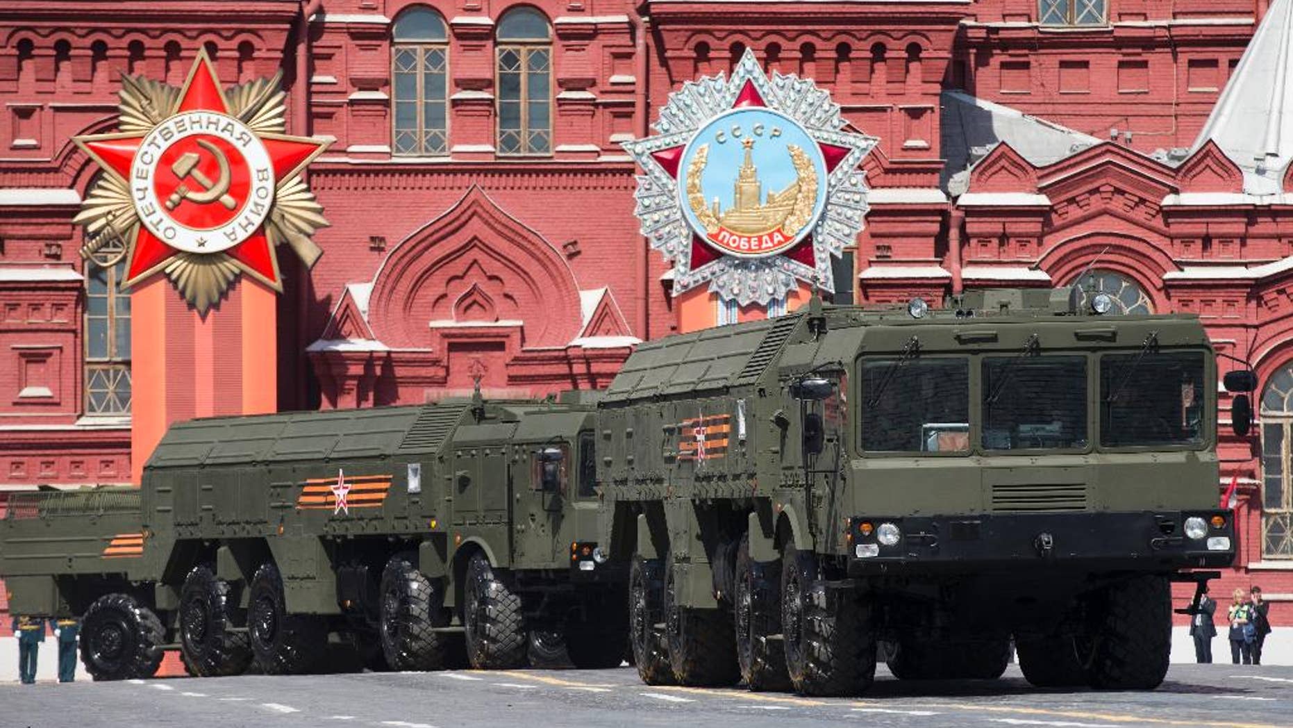 FILE - In this file photo taken on Saturday, May 9, 2015, Iskander missile launchers are driven during the Victory Parade marking the 70th anniversary of the defeat of the Nazis in World War II, in Red Square in Moscow. Poland and Estonia expressed concerns Saturday, Oct. 8, 2016, that Russia has moved nuclear-capable Iskander ballistic missiles into Kaliningrad, a Russian region on the Baltic Sea, with one official saying Russia appears eager to dominate that body of water. (AP Photo/Alexander Zemlianichenko, file)