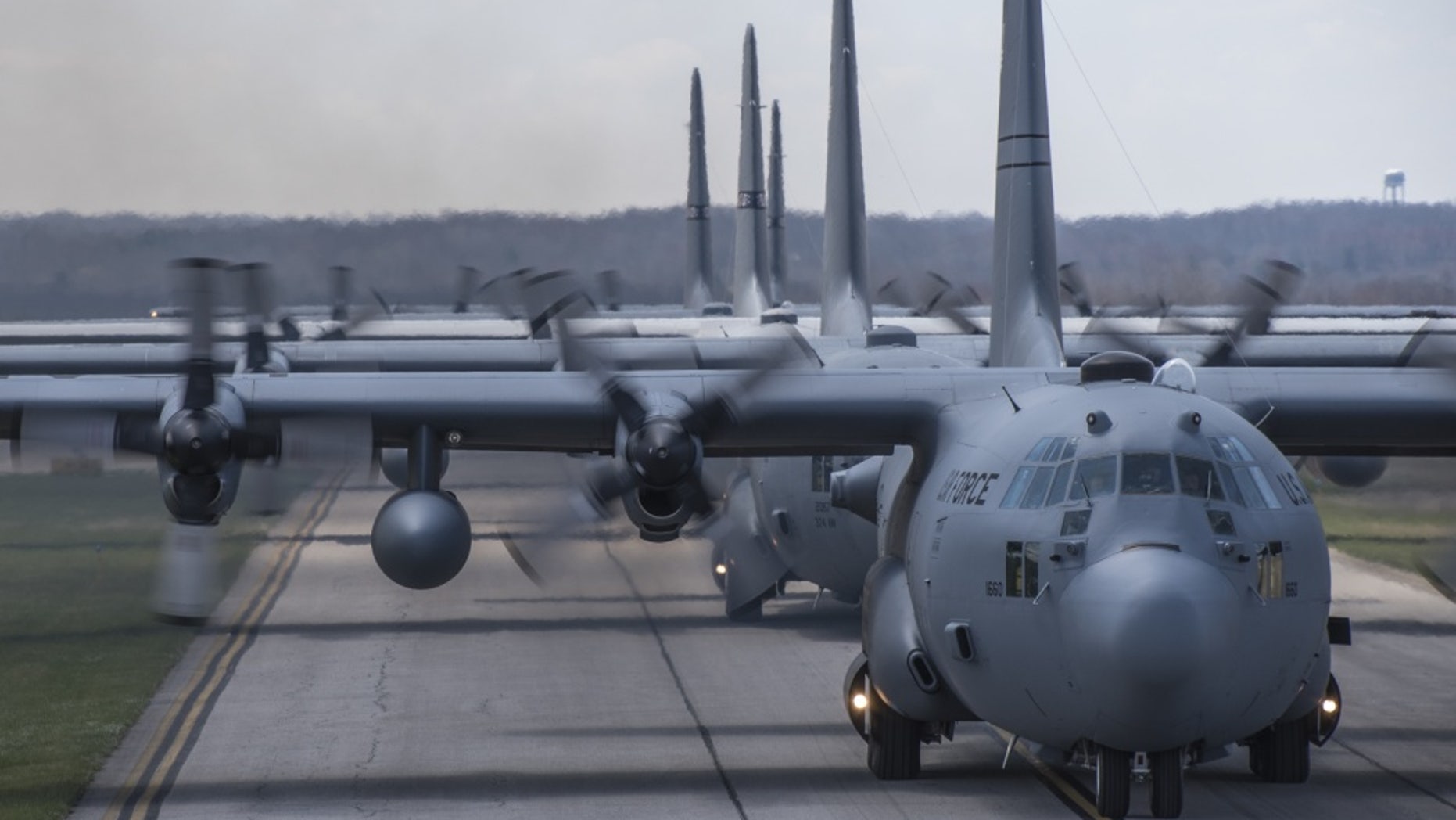 File photo - The 179th Airlift Wing conducts a five ship formation flight using five of their eight C-130H Hercules to conduct coordinated airdrops, April 26, 2018. As the unit's first five ship formation since the conversion back to the C-130H, the flight allowed members of maintenance, aerial port and operations groups to work together increasing overall readiness of deployable assets. (U.S. Air National Guard photo by Tech. Sgt. Joe Harwood/RELEASED)