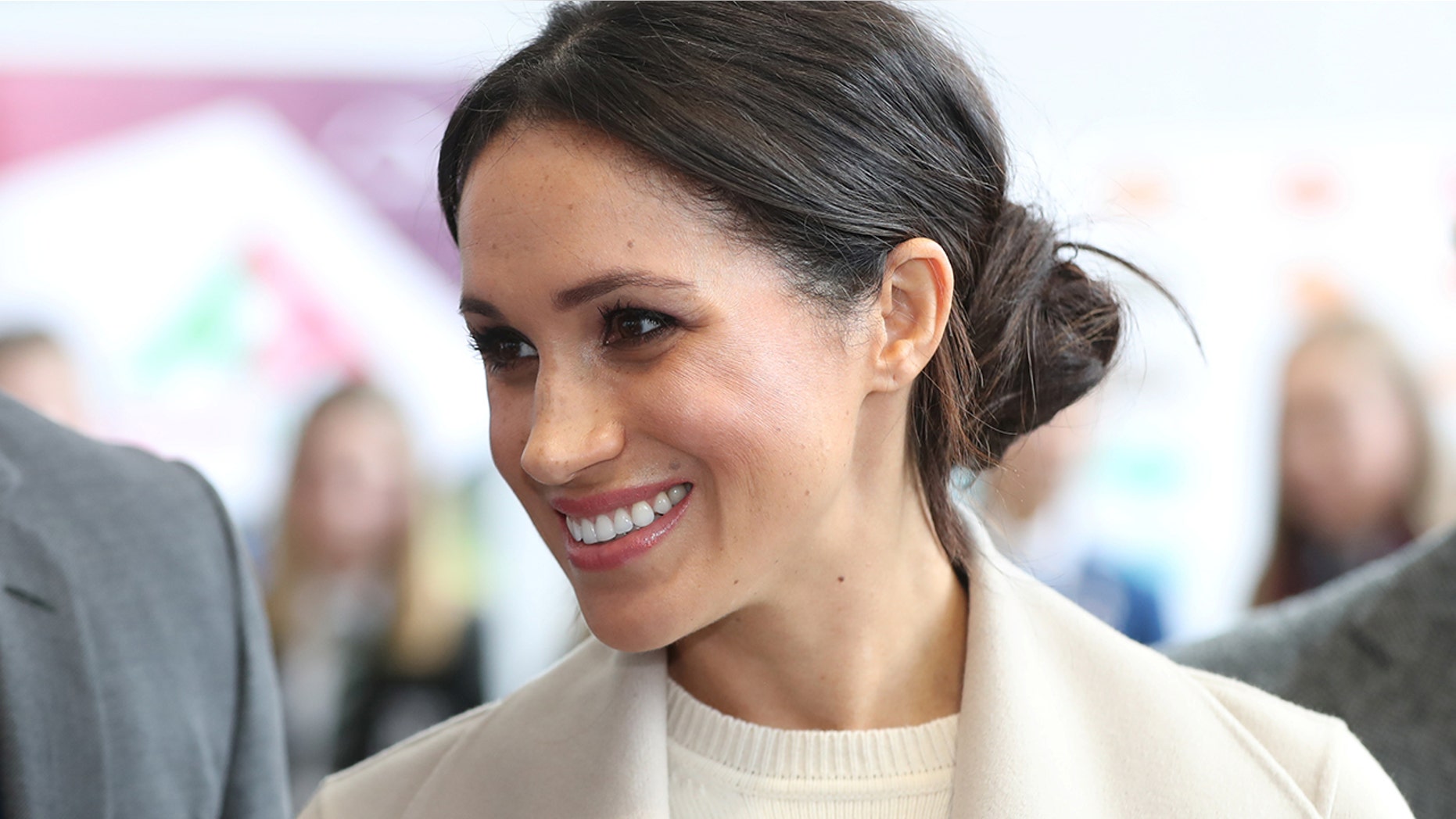 Meghan Markle's messy side bun isn't exactly the royal norm, but it still looked effortless and chic.