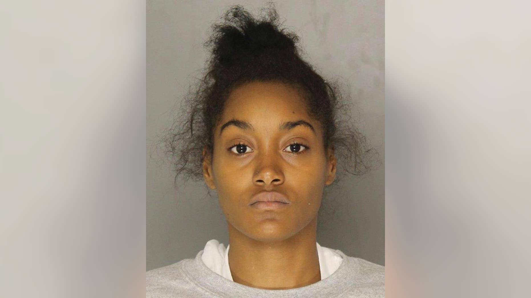 FILE - This Wednesday, Nov. 2, 2016, file booking photo provided by the Allegheny County Police Department shows Christian Clark, of McKeesport, Pa. Police said Clark, charged with criminal homicide in the death of her son Andre Price III, sent a video of the boy's apparently lifeless body to his father in a jealous, vengeful rage during a text-messaged argument. Clark is due in court Wednesday, Nov. 16. (Allegheny County Police Department via AP, File)