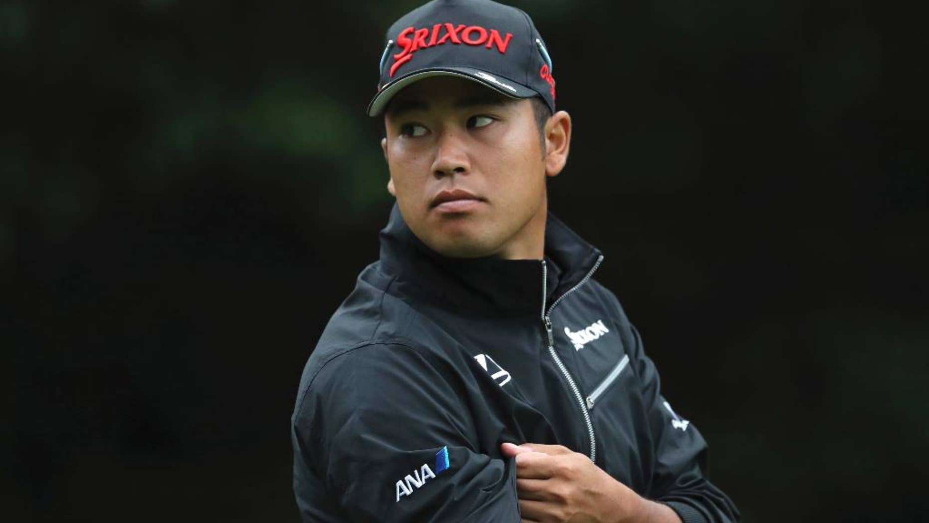 FILE - In this Oct. 27, 2016 file photo, Japan's Hideki Matsuyama walks on the fairway during the WGC-HSBC Champions golf tournament at the Sheshan International Golf Club in Shanghai, China. Matsuyama and Ryo Ishikawa will represent Japan in the world cup of golf starting in Melbourne on Thursday, Nov. 24, 2016. (AP Photo/Ng Han Guan, File)