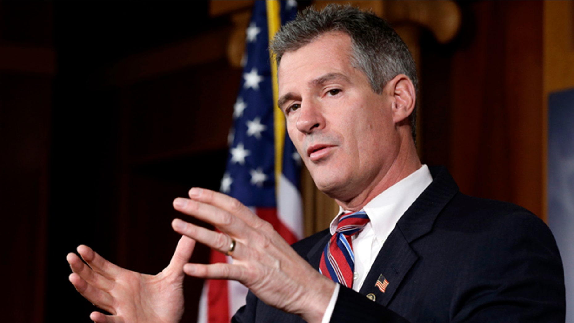 Nov. 13, 2012: In this file photo, Sen. Scott Brown, R-Mass., speaks during a media availability, on Capitol Hill in Washington.
