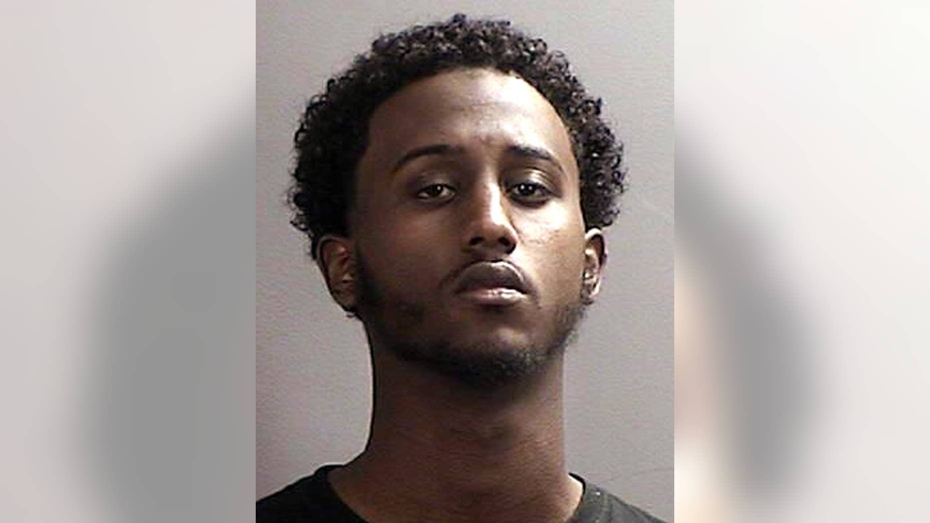 FILE - This file photo provided April 21, 2015 by the Sherburne County, Minnesota, Sheriff’s Office shows Hanad Mustafe Musse, 19. Musse is among seven Minnesota men of Somali descent that have been charged in a indictment with traveling or attempting to travel to Syria to join the Islamic State group, which has carried out a host of attacks including beheading Americans. (Sherburne County Sheriff’s Office via AP, File)