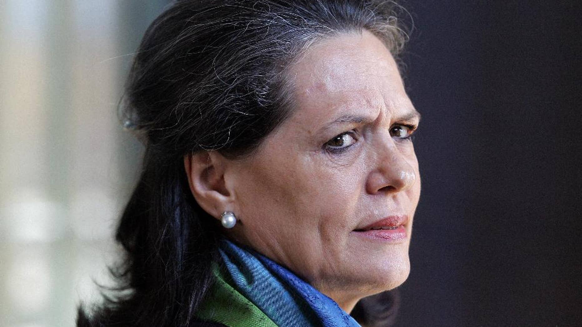 FILE - In this August 21, 2007 file photo, India's Congress party President and Chairperson of the ruling United Progressive Alliance (UPA) Sonia Gandhi looks on during her visit at the Apartheid Museum in Johannesburg, South Africa. The leader of opposition was hospitalized for a viral fever on Tuesday, Nov. 29, 2016, a party official said. Gandhi, 69, has faced past health problems, but her party has long kept a veil over her personal life. She flew to the United States for surgery in 2011, but the party never provided more than cursory information about her condition. (AP Photo/Themba Hadebe, File)